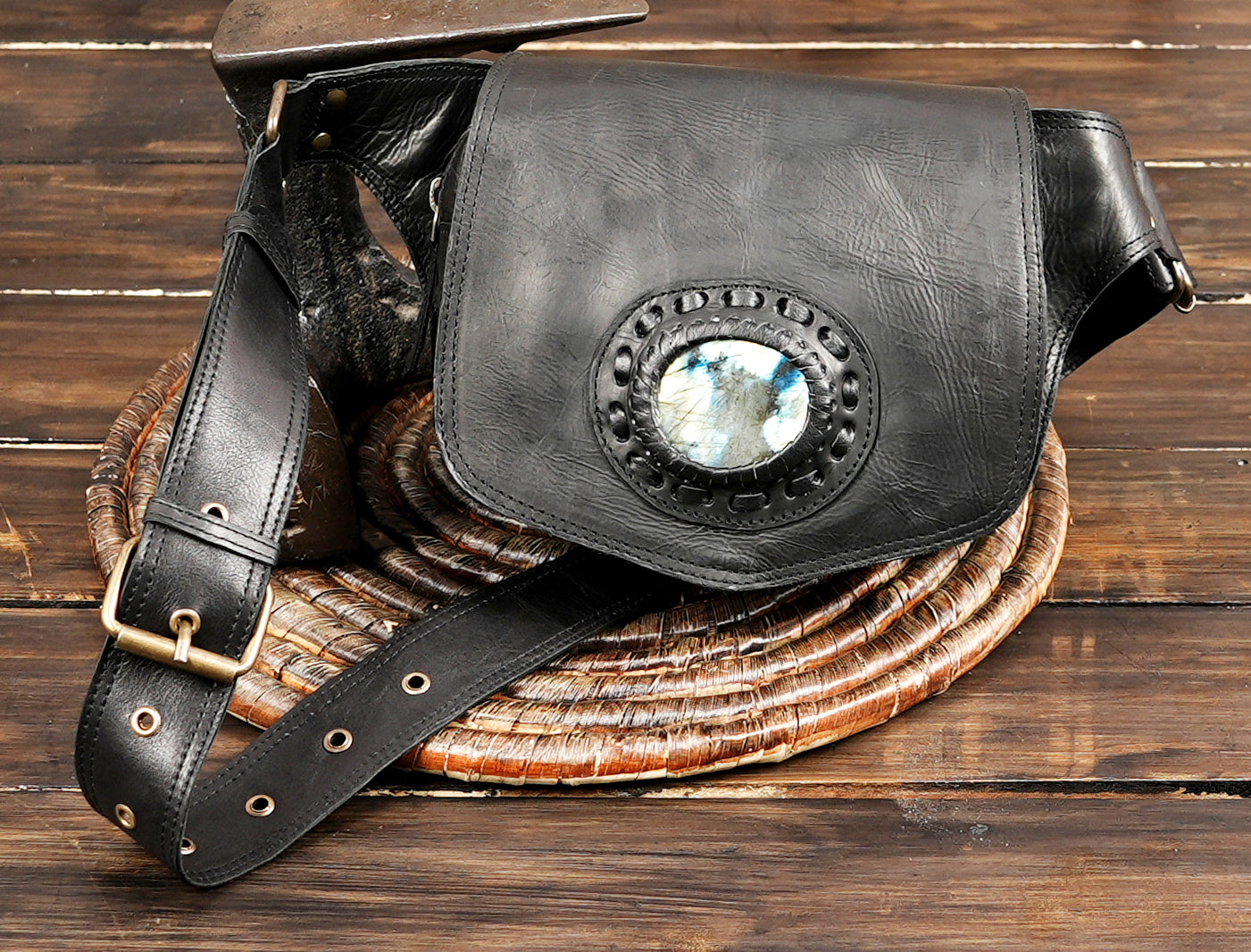Fashionable leather waist pack with buckle strap and stone accent