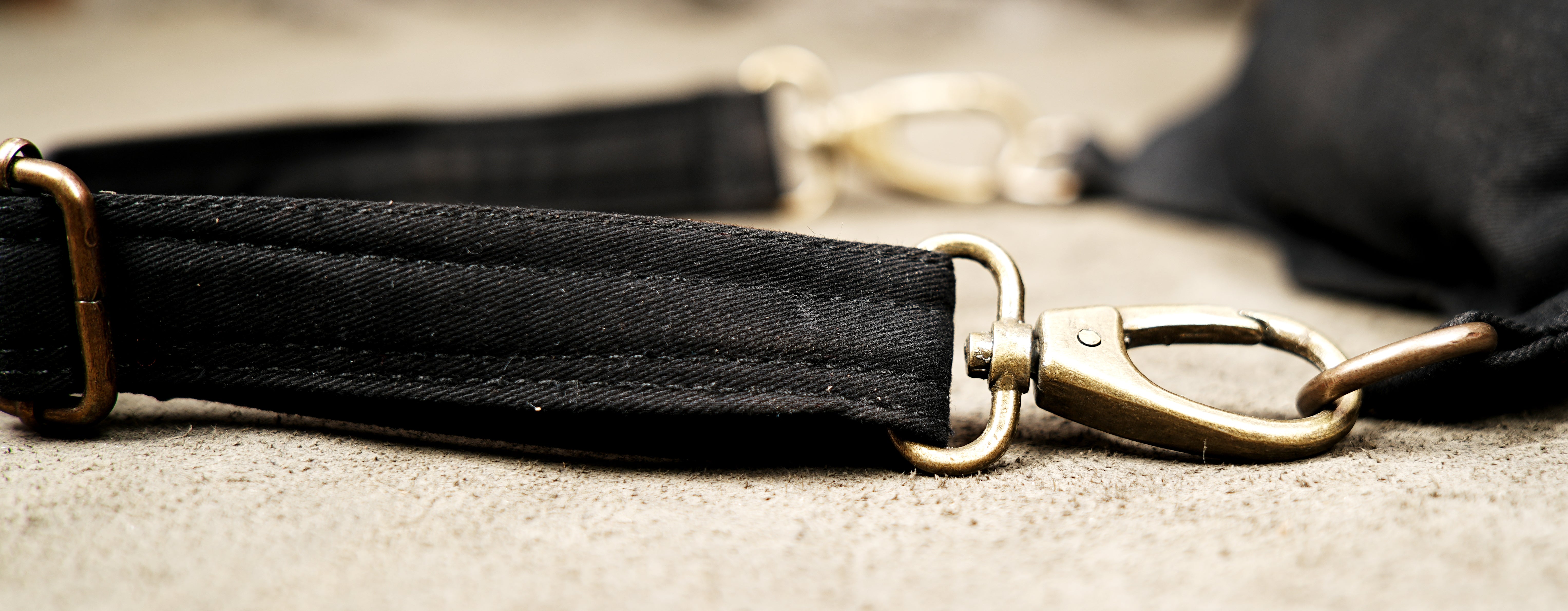 Gothic cyberpunk canvas waist pack with metal D-rings and adjustable thigh strap.