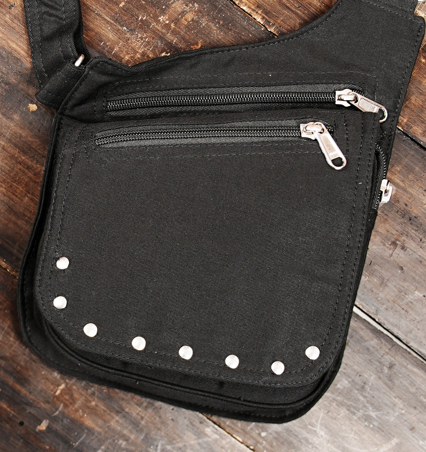 Unisex canvas shoulder holster bag featuring dual multi-zippered utility pouches