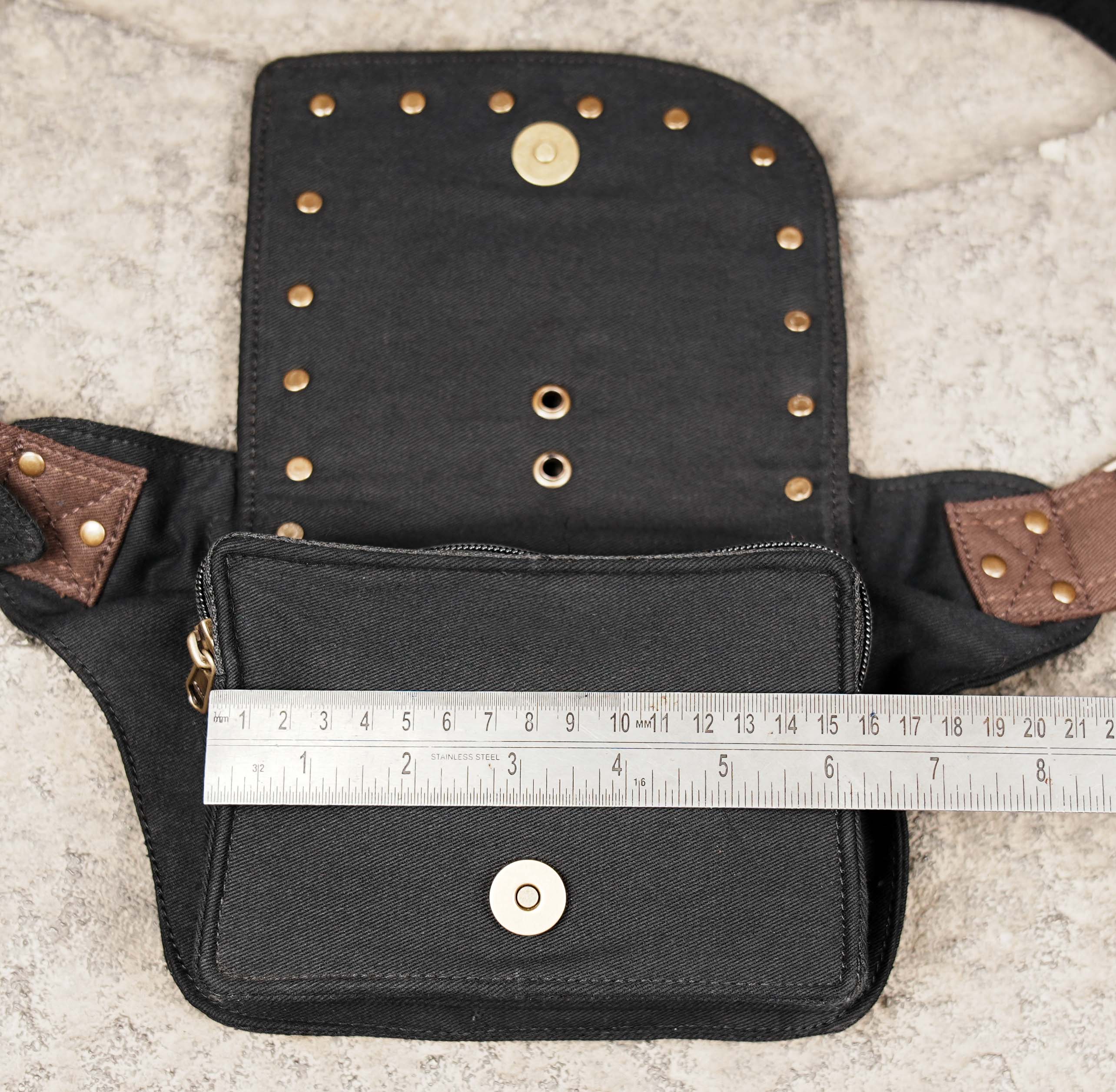 Black handmade waist bag with brown detailing