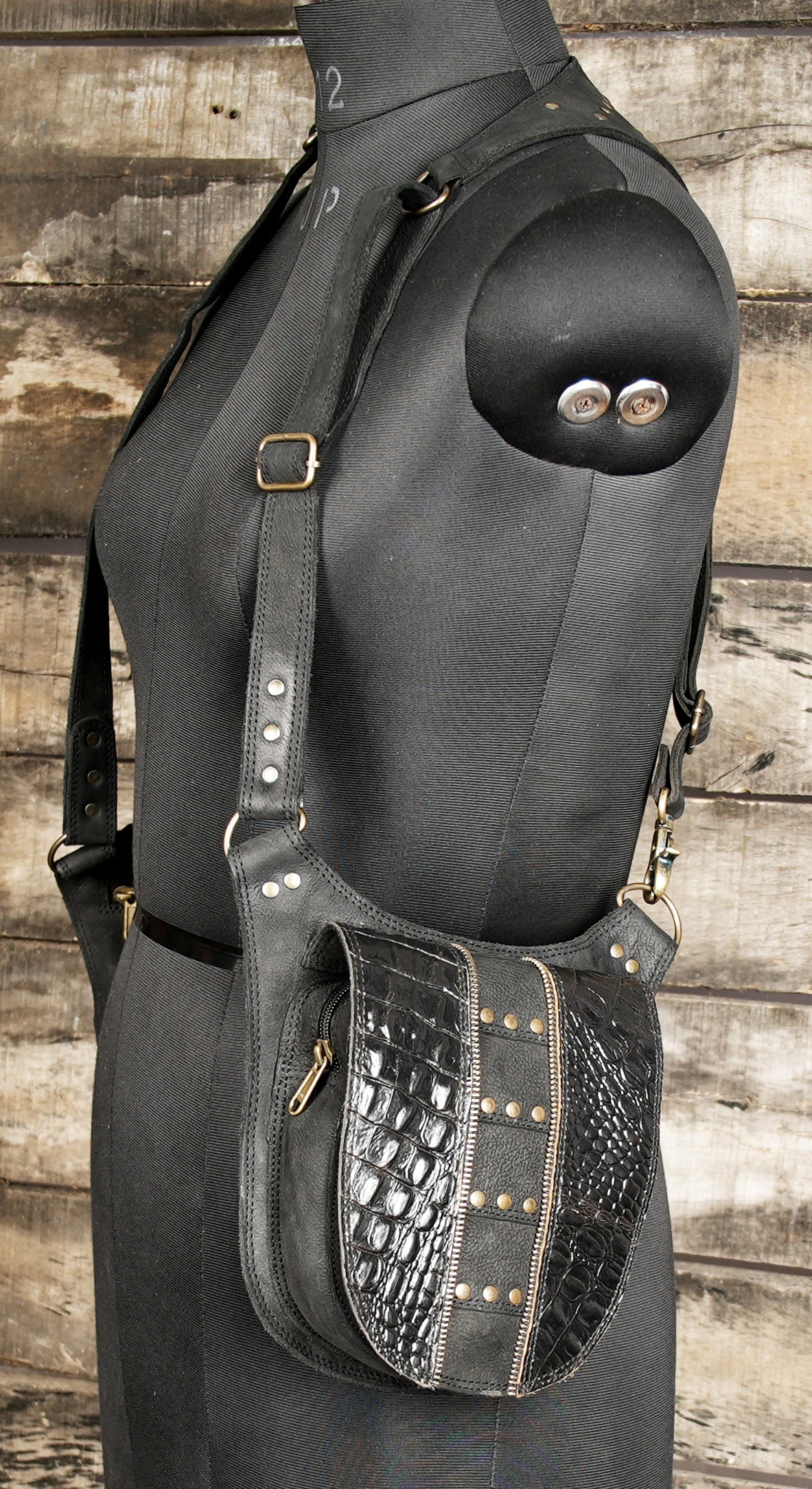 Black embossed leather holster for hands-free carrying