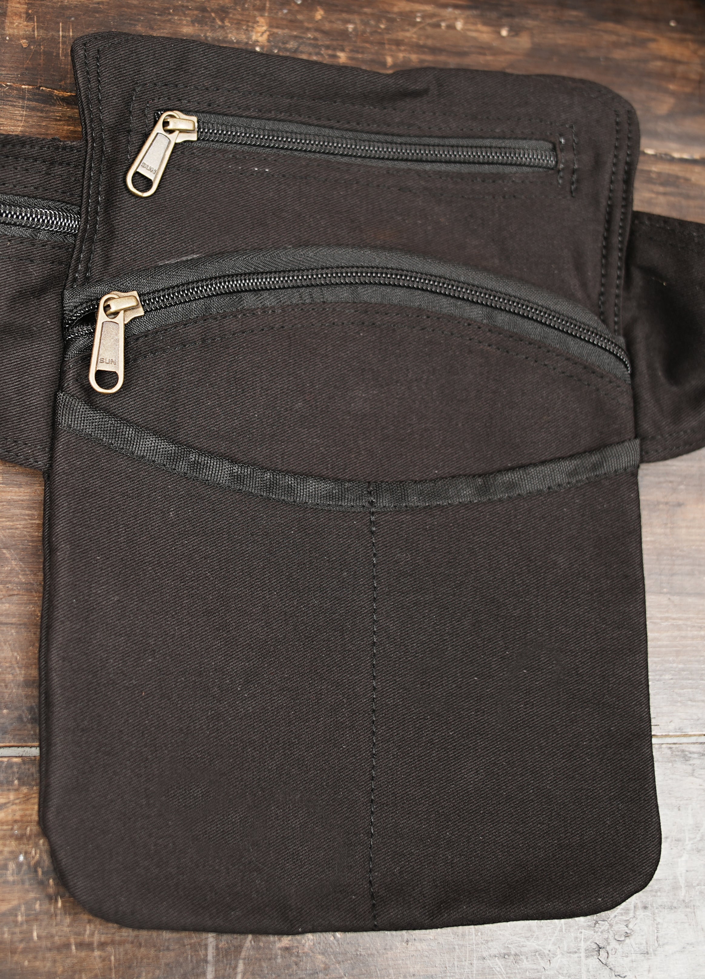 Travel belt bag with multiple compartments for phone wallet and keys
