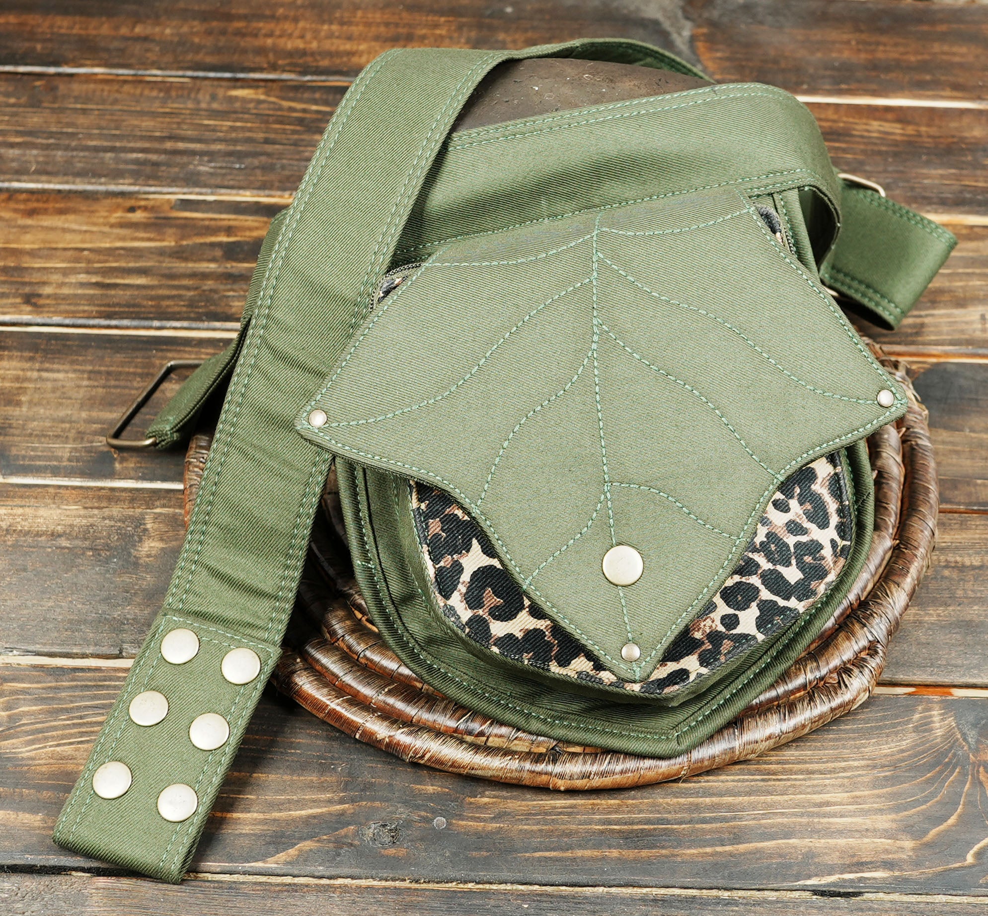 Handmade fabric waist bag with a bohemian touch, featuring a unique leaf shape