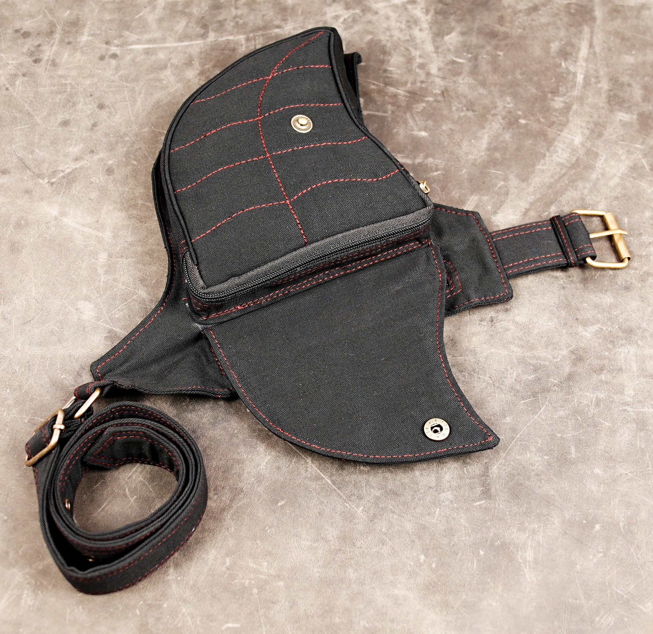 Steampunk canvas utility pouch with brass roller buckle flat lay