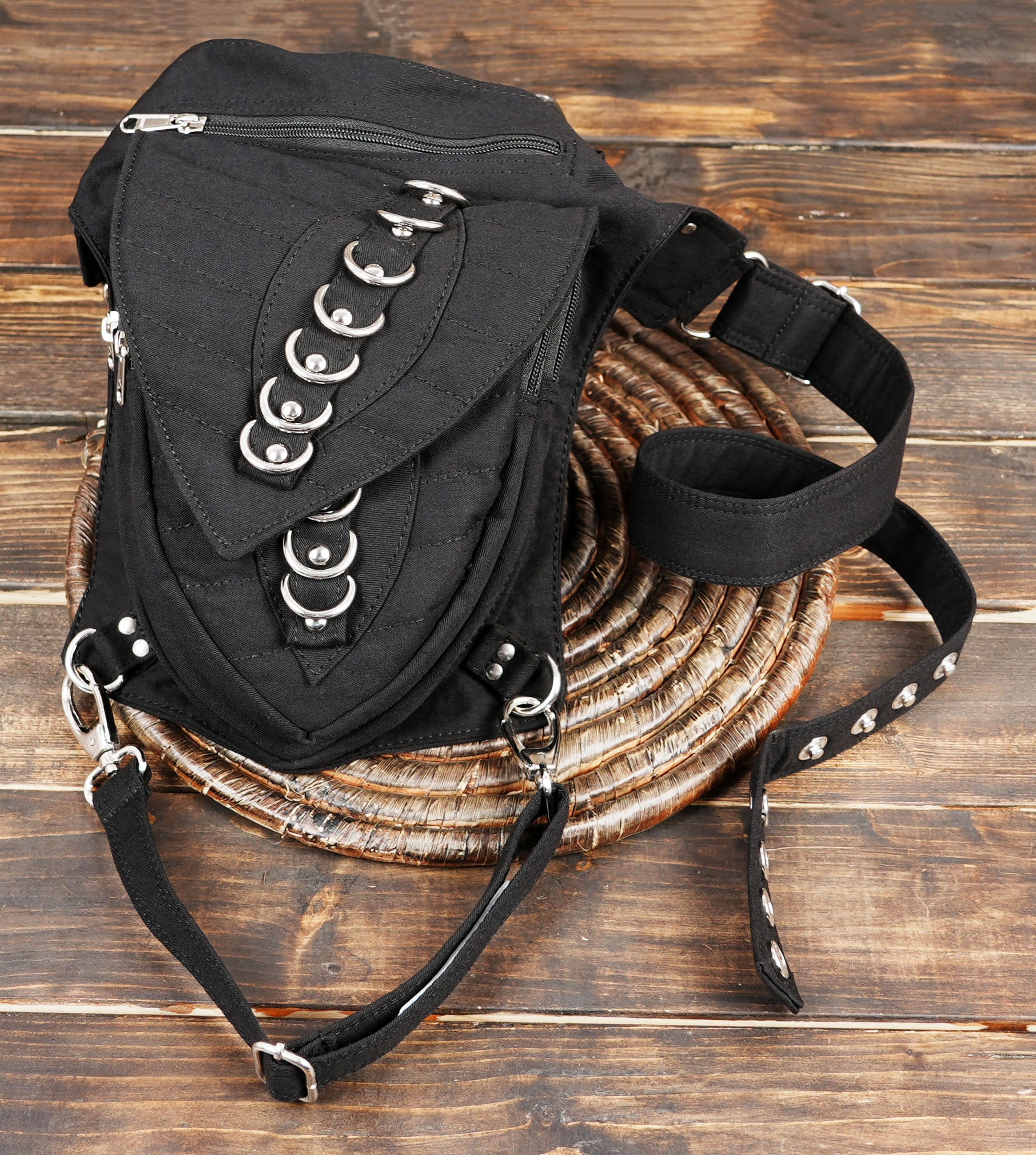 Heavy duty everyday carry black canvas waist bag with thigh loop.
