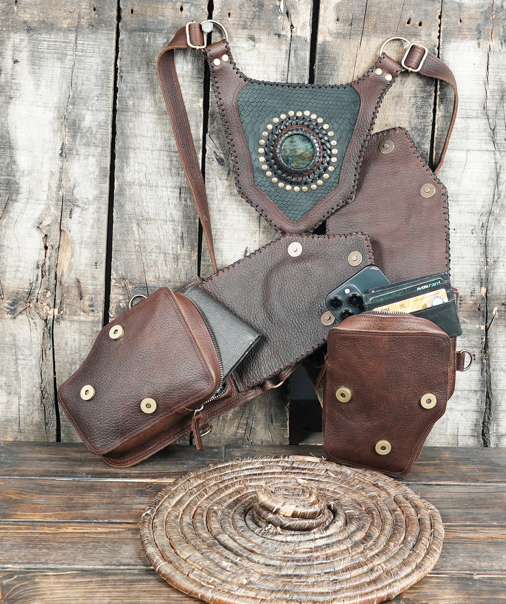 Leather shoulder holster with twin storage pockets