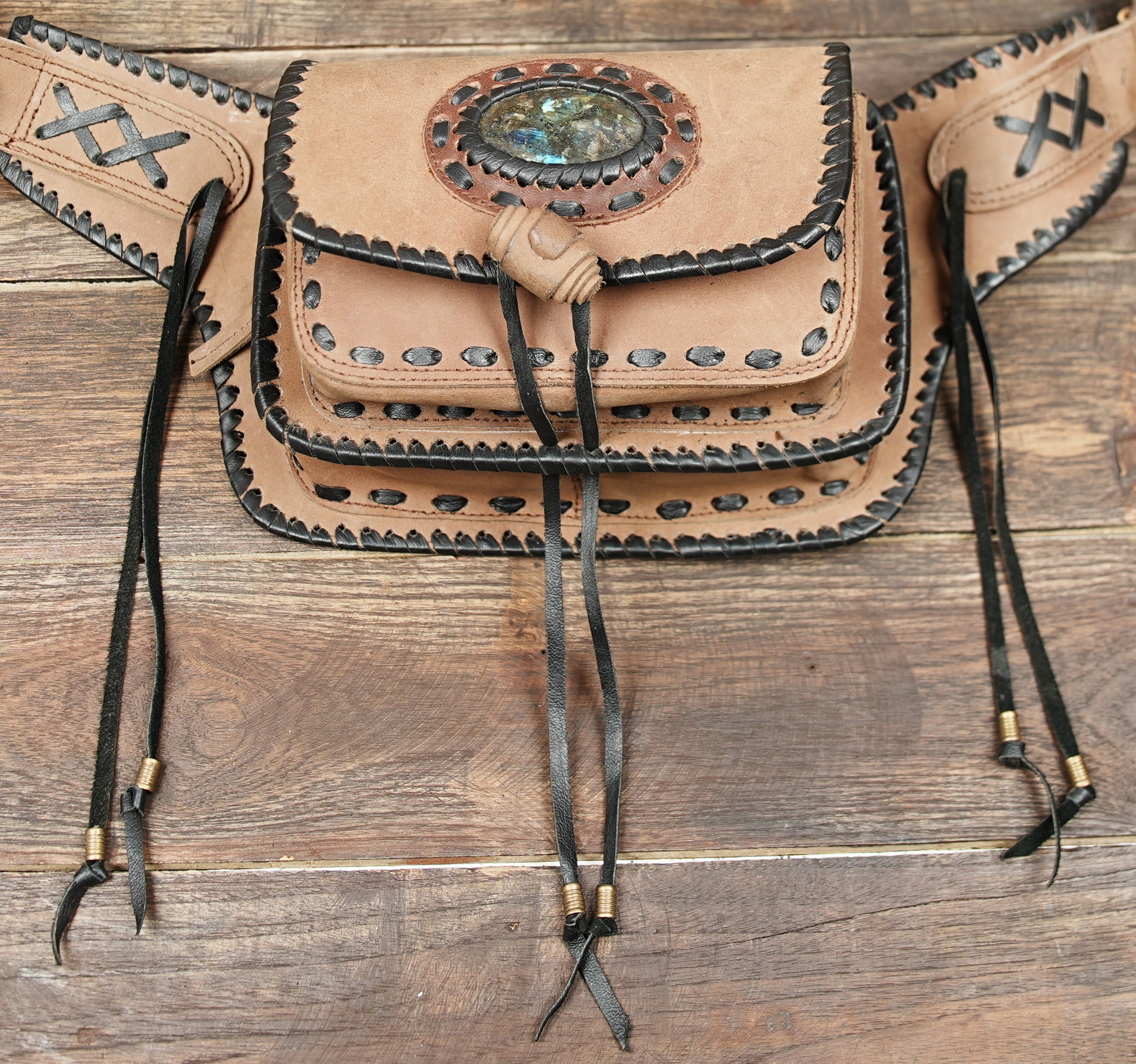 Brown leather utility waist belt with adjustable strap