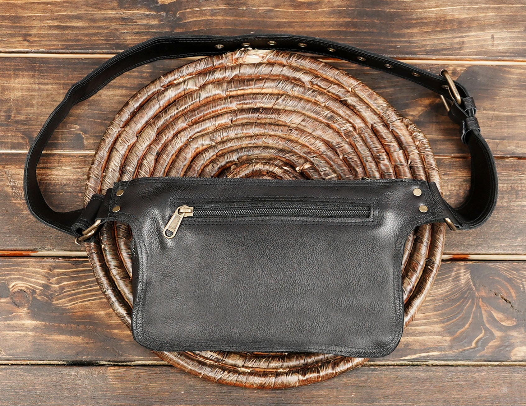 Handmade black leather hip pouch for concerts and festivals