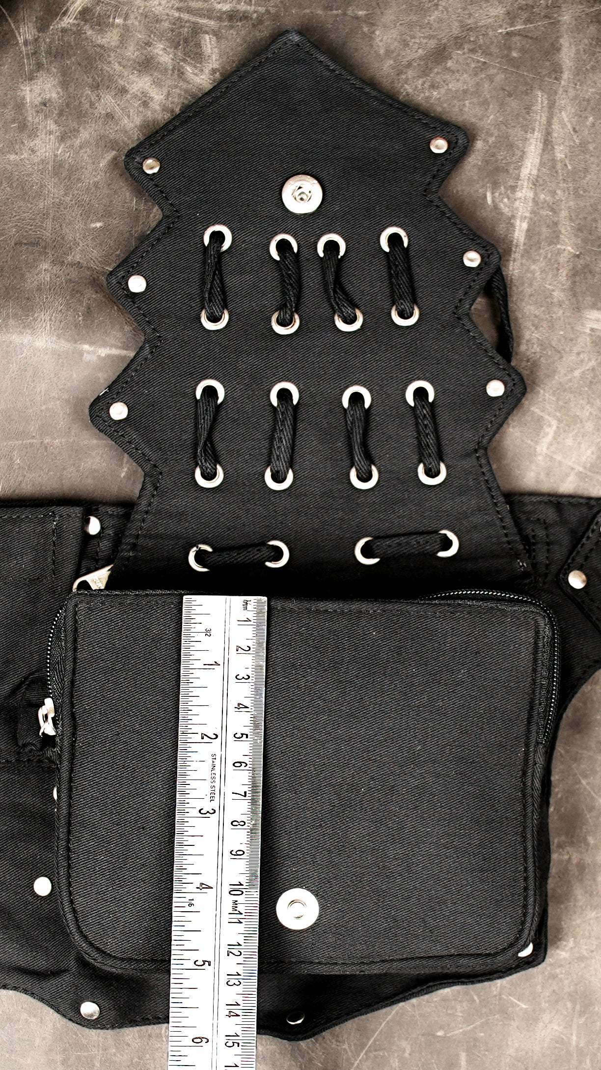 Boho style cotton fanny pack, intricate lace-up front, perfect for music festivals.