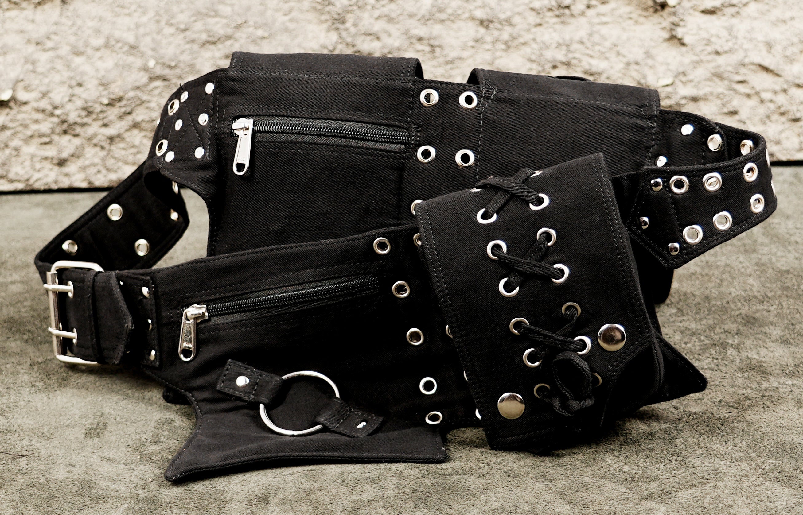 Handcrafted black cotton hip belt with detachable-style pockets for phone and wallet