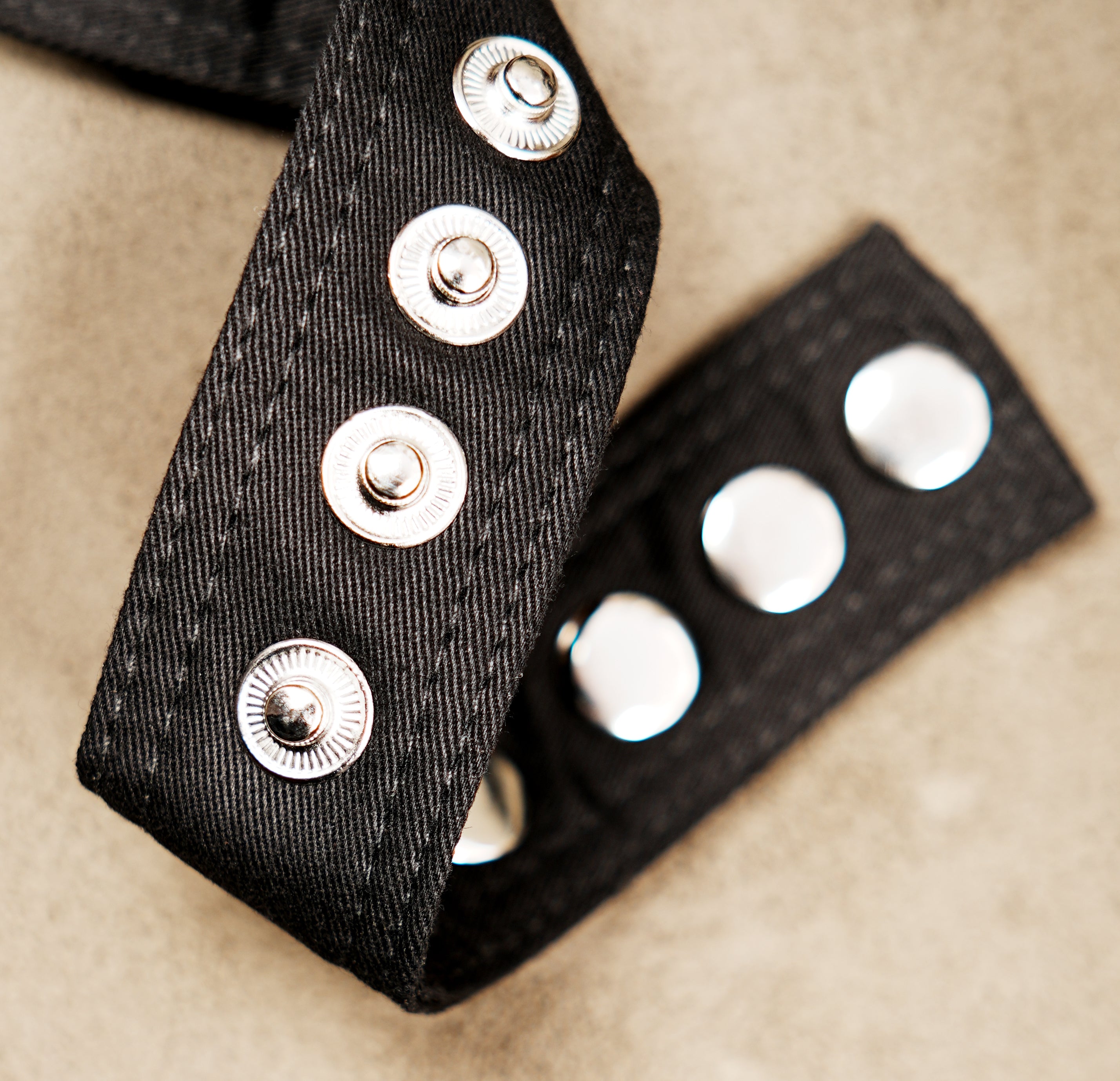 Versatile waist pack for travel and hiking, crafted from black cotton fabric.