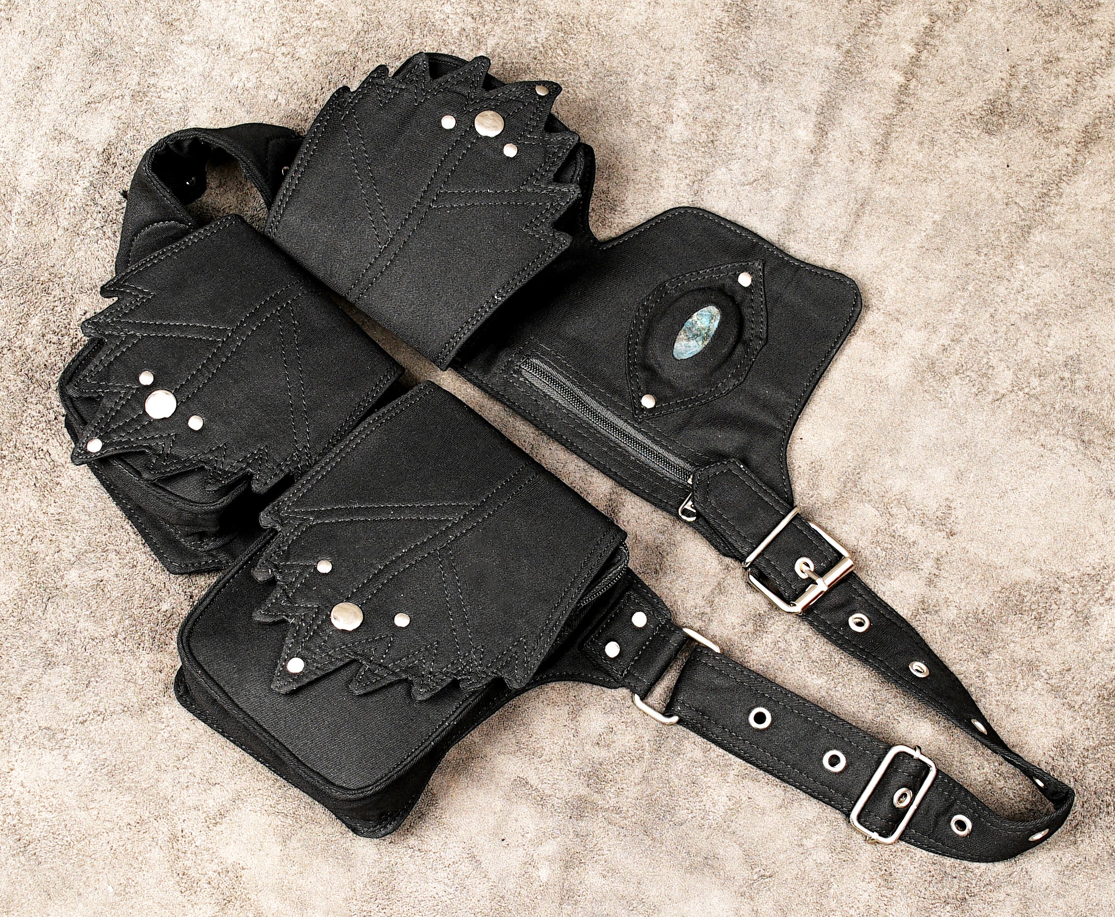 Festival gear black hip bag with pouches, ideal for rave and alternative fashion.