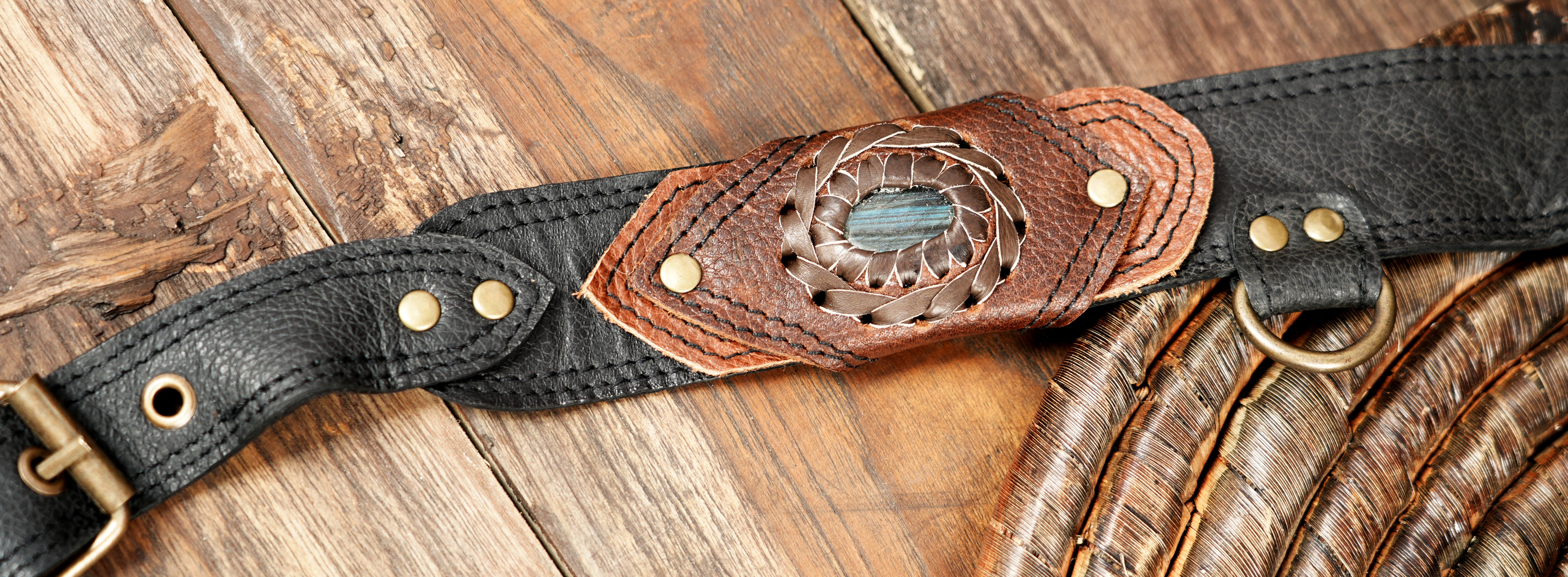 Close-up of handcrafted leather harness with gemstone detail