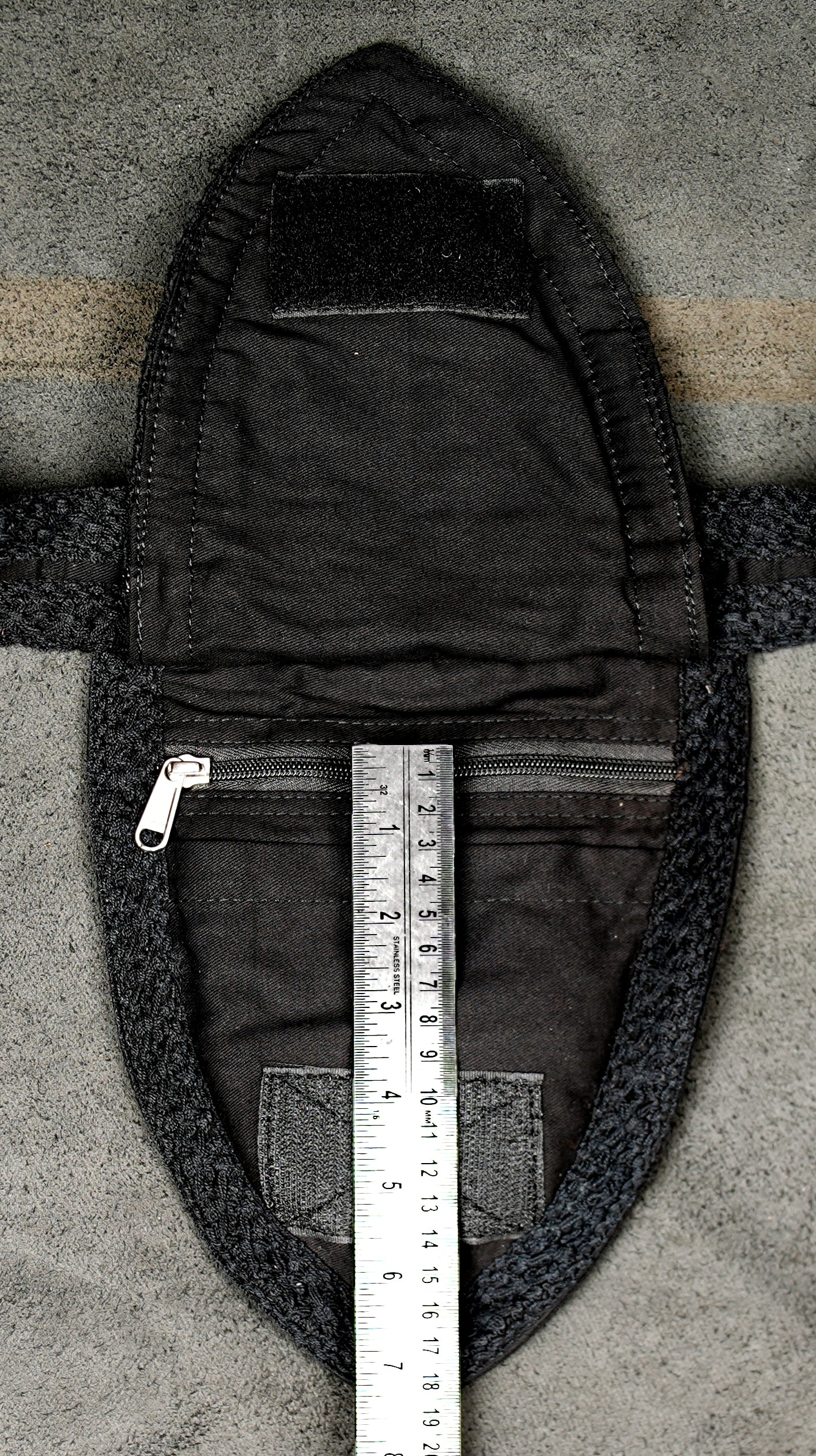 Minimalist black festival bum bag with buckle closure and silver rivets