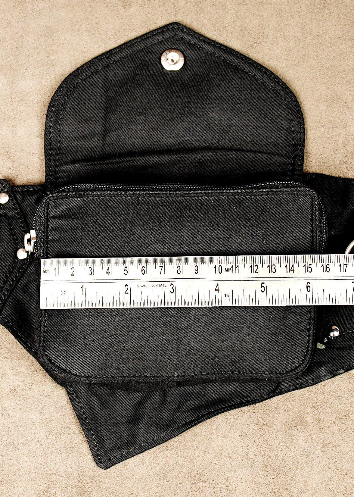 Concert and music festival utility belt: black, studded, multi-pocket hip bag.