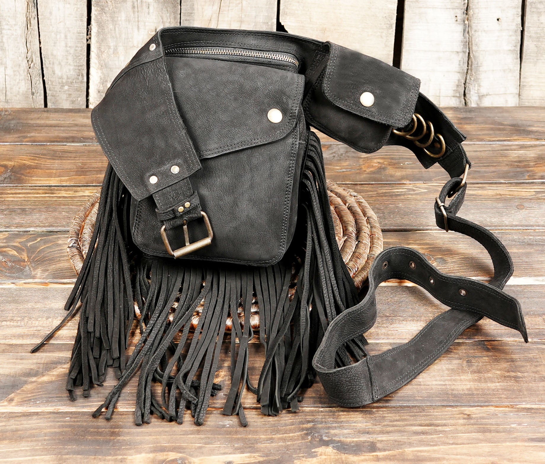 Festival leather thigh belt with multiple pockets and boho fringe