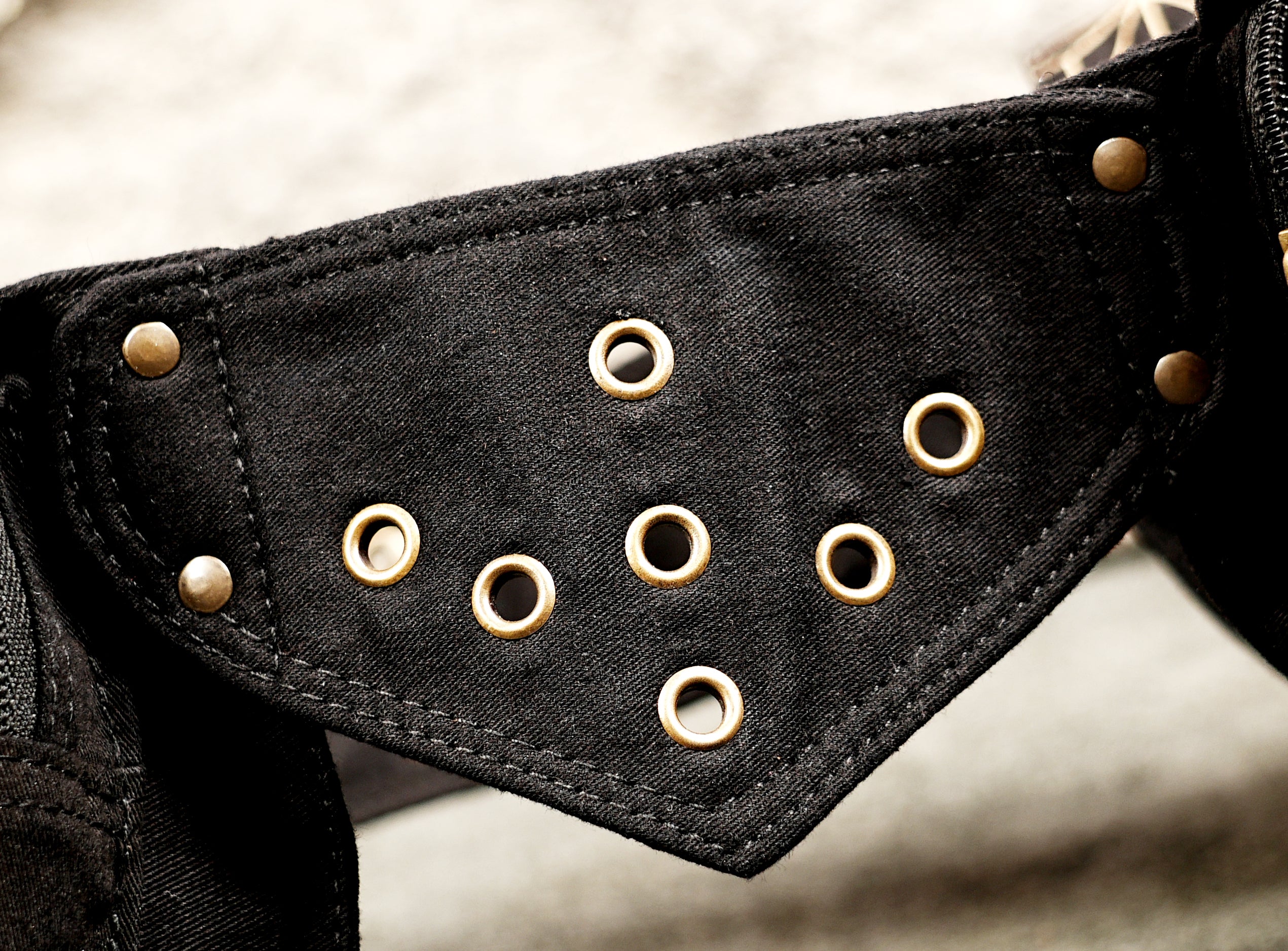 Unisex utility belt with three detachable-style pouches in black and gold print