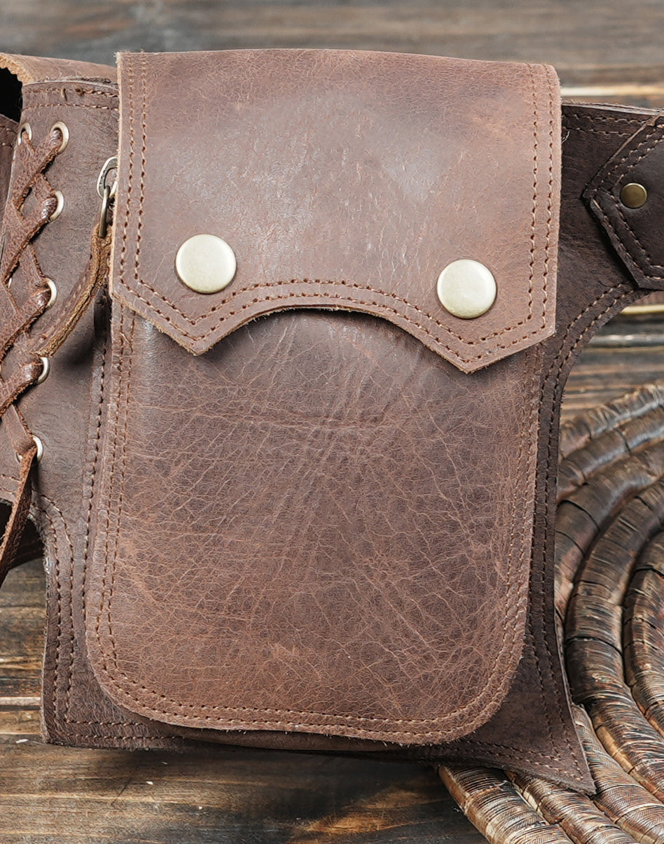 Adjustable leather utility belt with snap button pockets