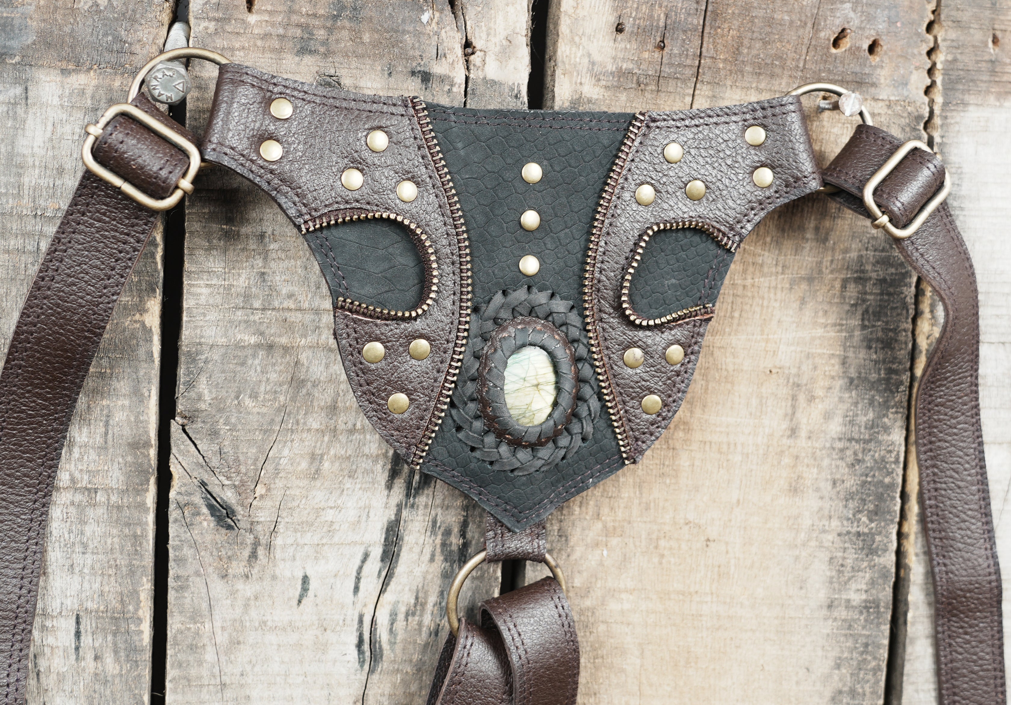 Gothic inspired leather holster with braided stone centerpiece on each pouch