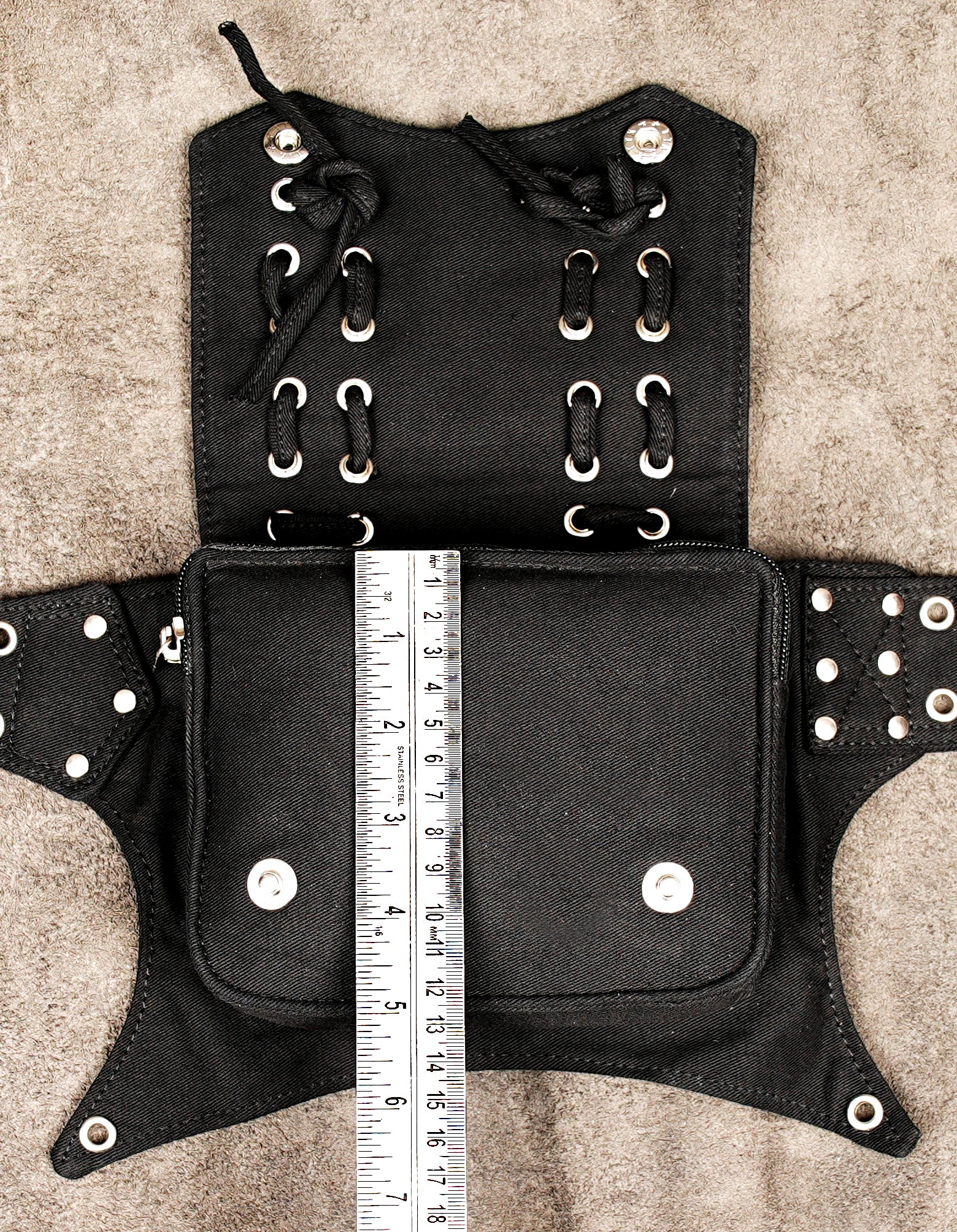 Concert and music festival utility belt: black, studded, multi-pocket hip bag.