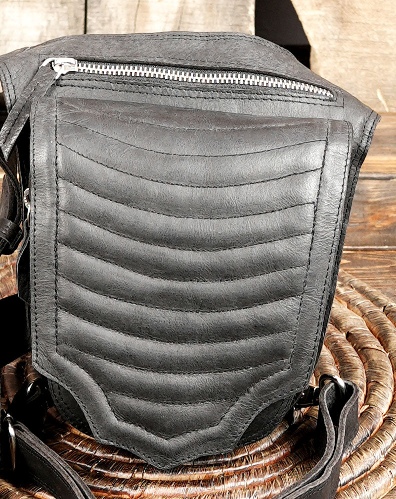 Steampunk style thigh pouch belt with adjustable waist strap.