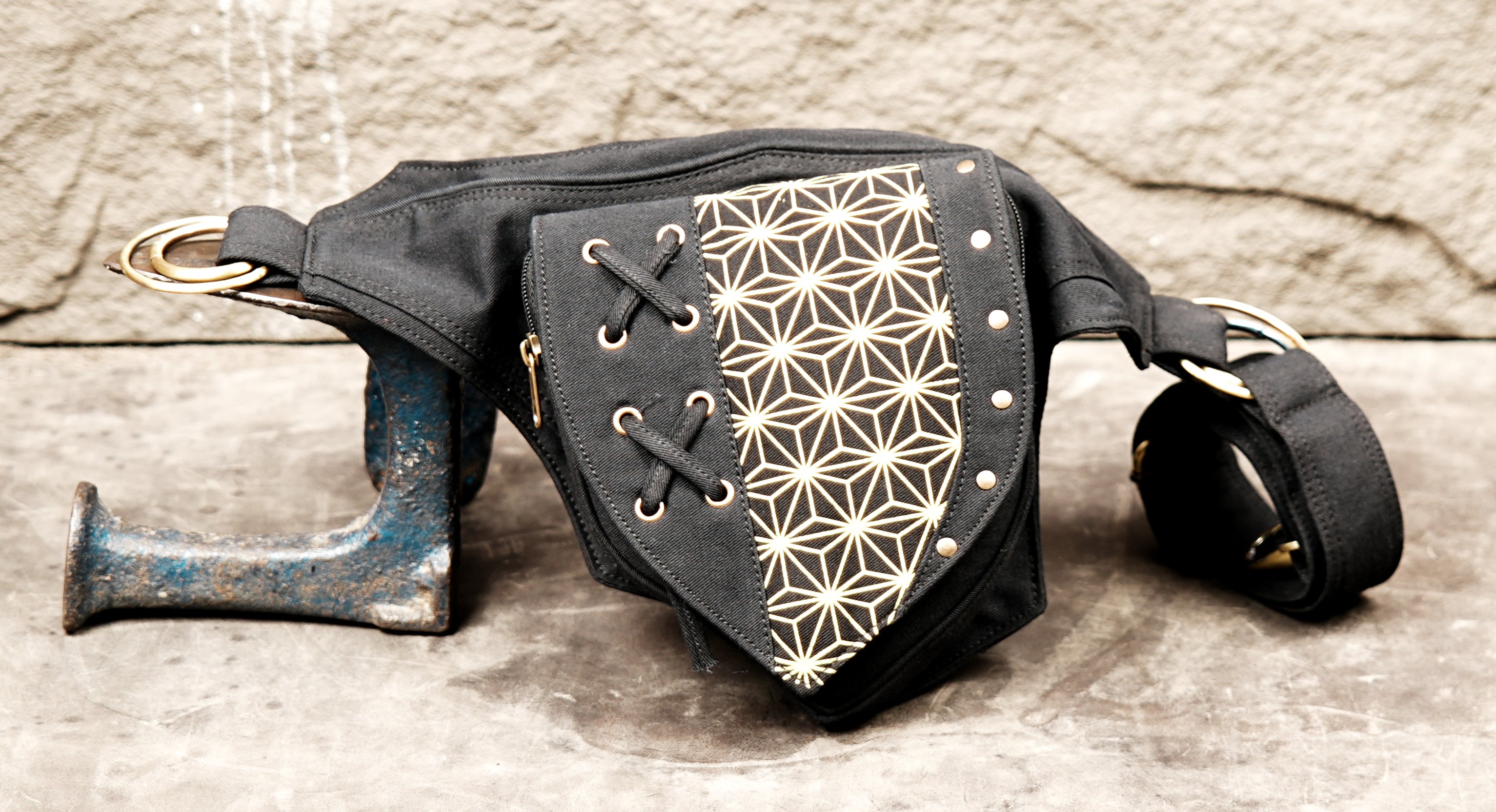Steampunk adventurer utility belt with one canvas pocket and distressed metal accents.