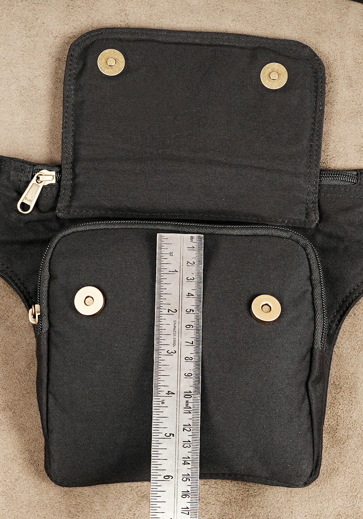 Black cotton fanny pack with adjustable belt and vintage brass slider