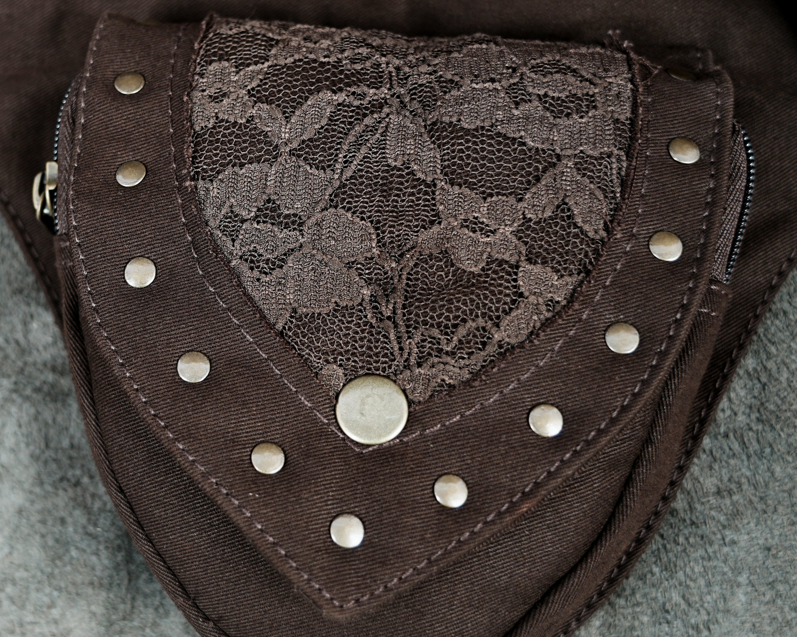 Multi-pocket cotton hip bag in chocolate brown for travel