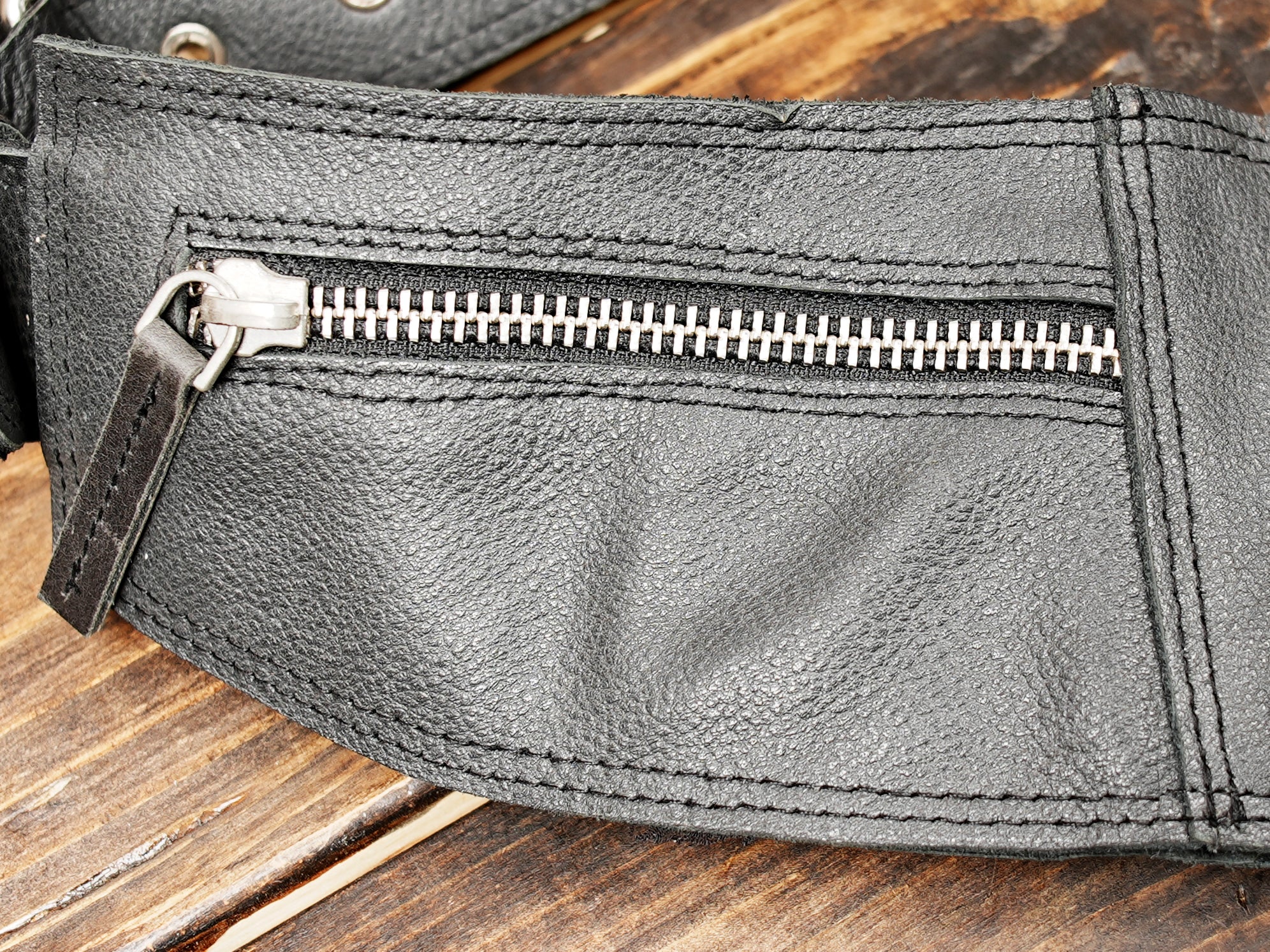 Bohemian-style fringe belt bag featuring a teardrop gemstone