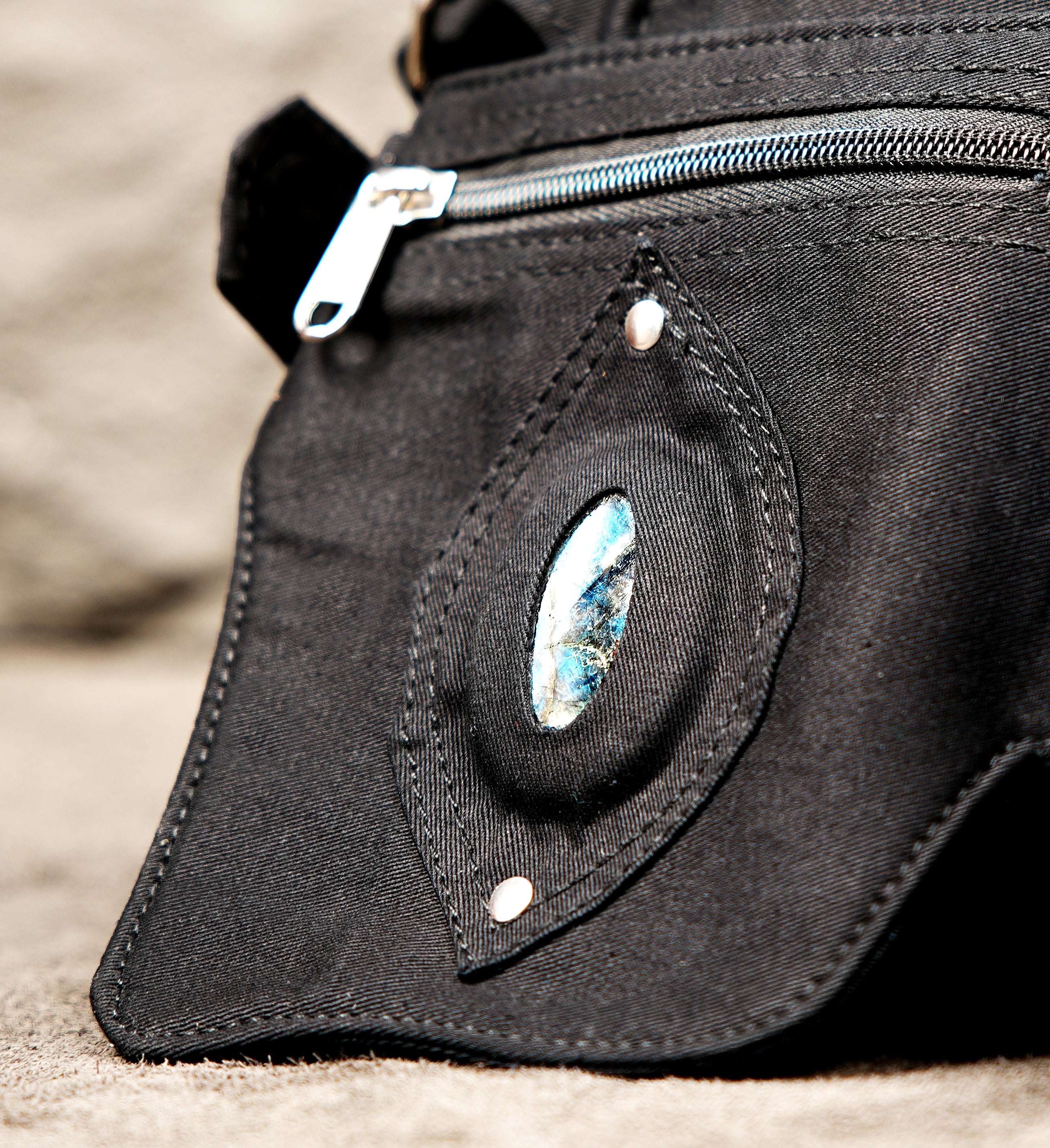 Rugged black multi-pocket pouch belt suitable for festivals and travel.