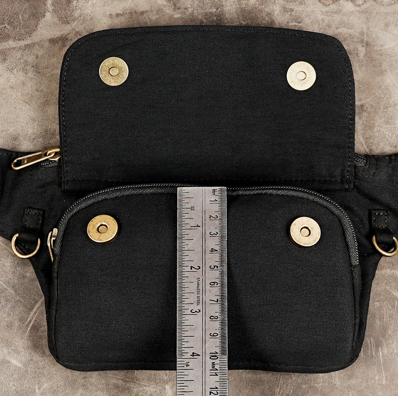 Black hiking waist pack made from sturdy cotton fabric