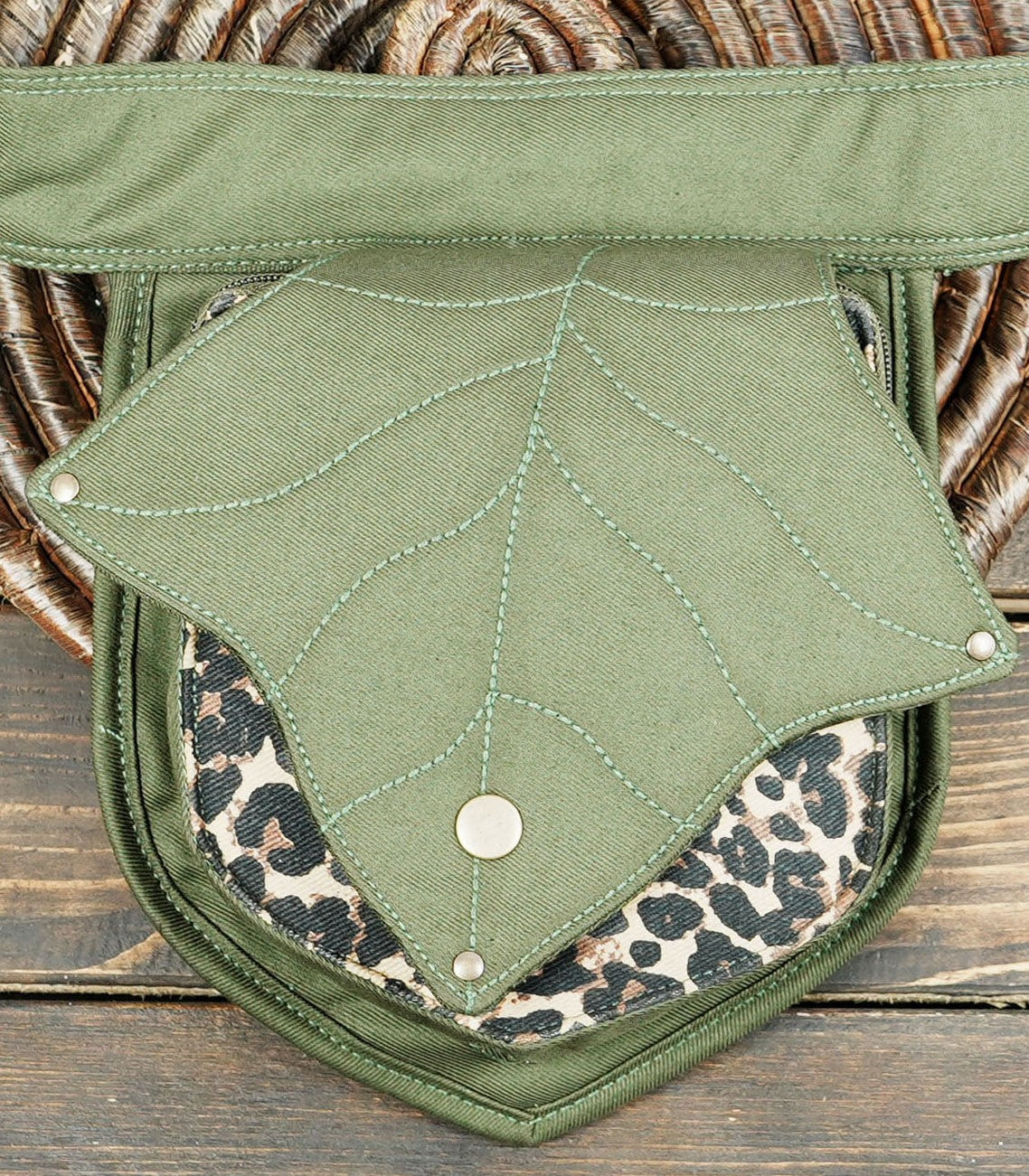 Trendy olive green utility belt pouch with a leopard print interior accent