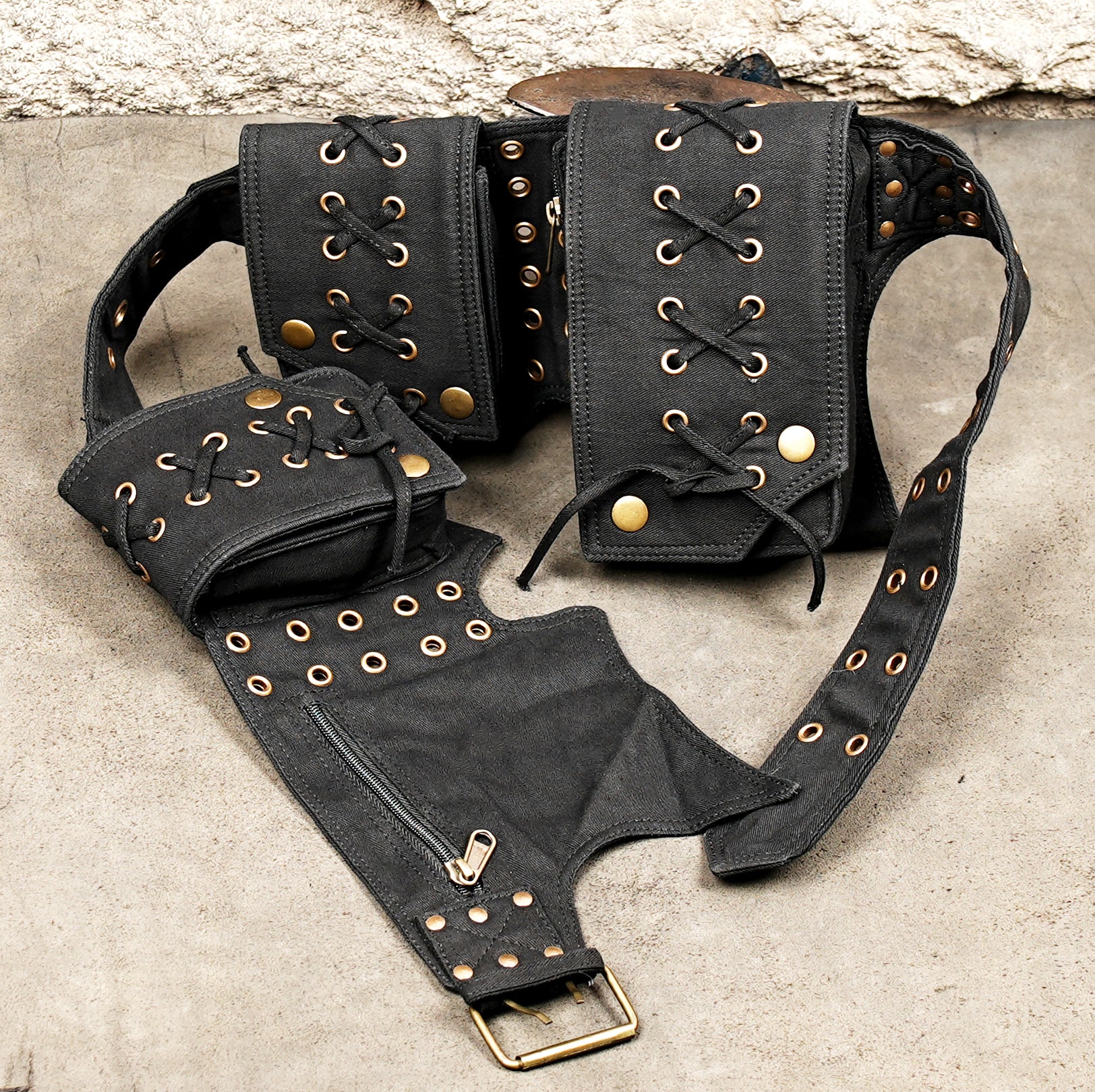Rugged black hip belt with metal grommets for festival wear