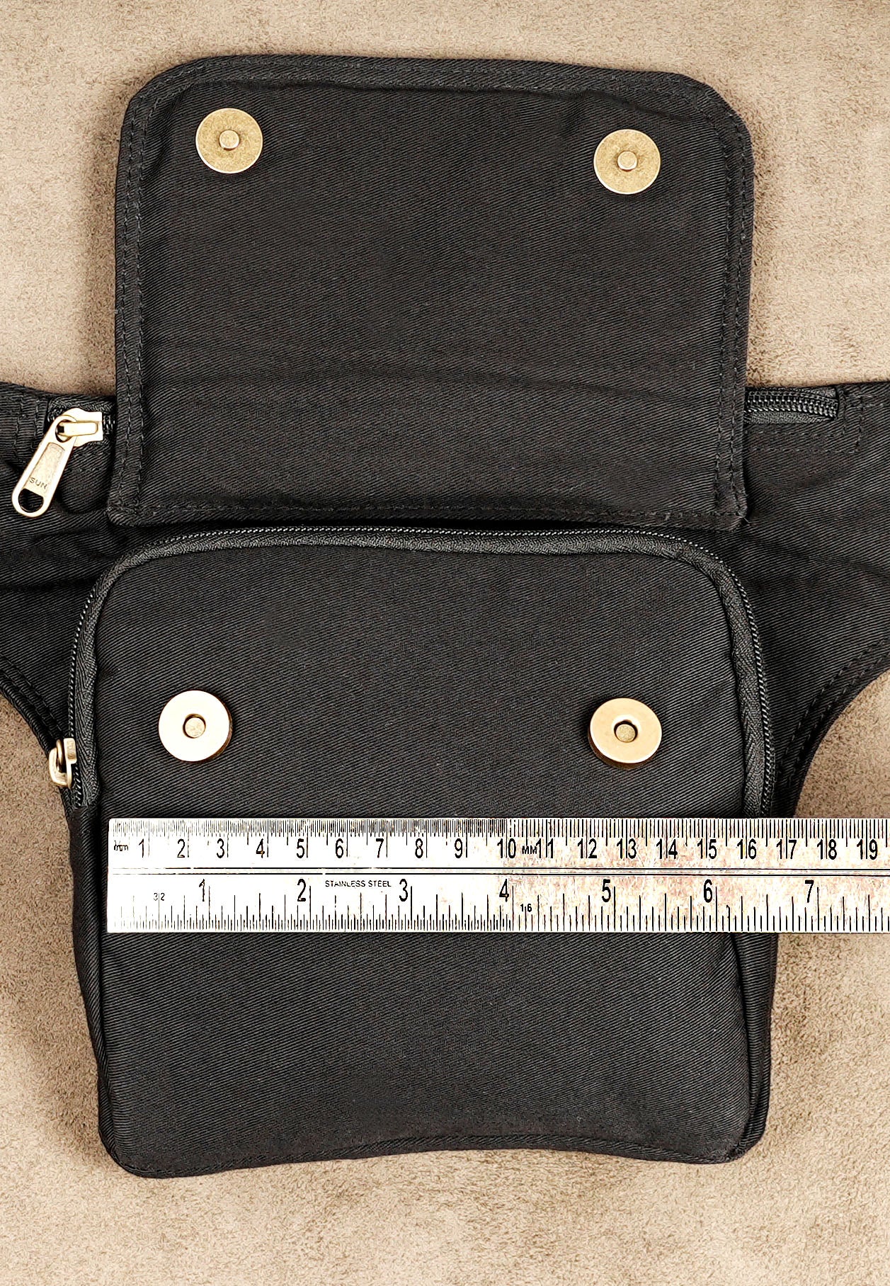 Hands-free black waist pouch for travel, hiking, and daily use