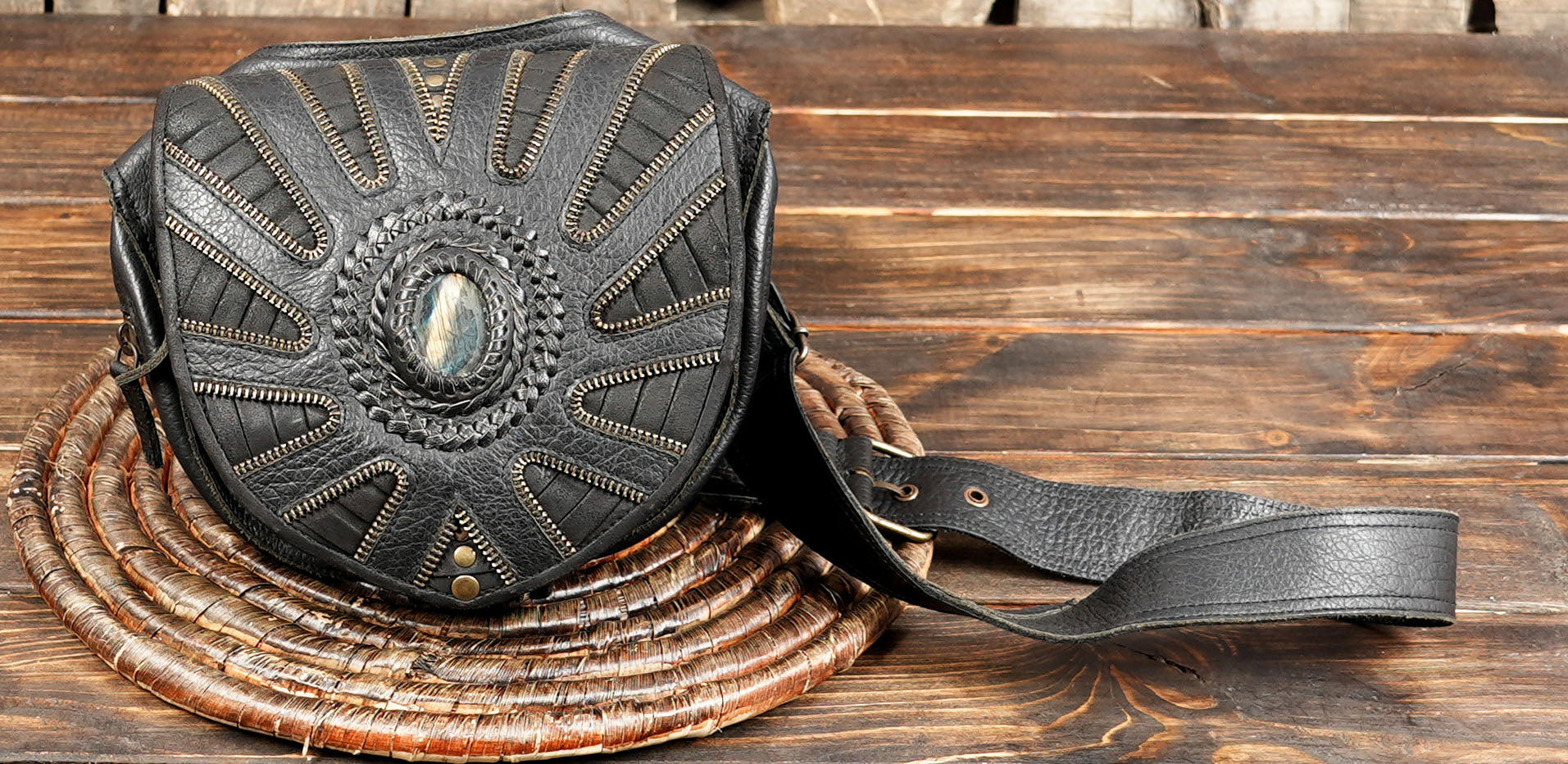 Handmade black leather waist belt bag with adjustable strap and stone centerpiece