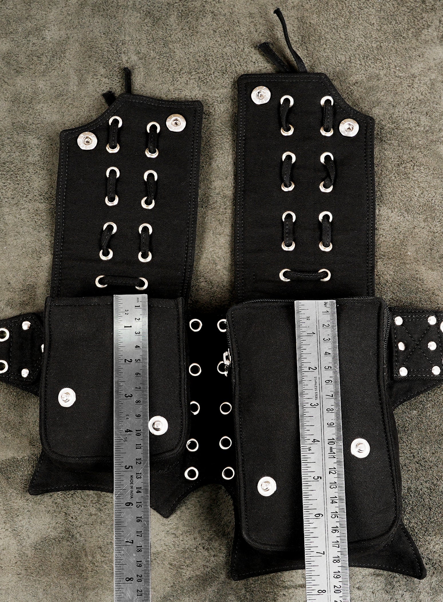 Gothic festival belt bag with silver rivets, eyelets, and lace-up pockets