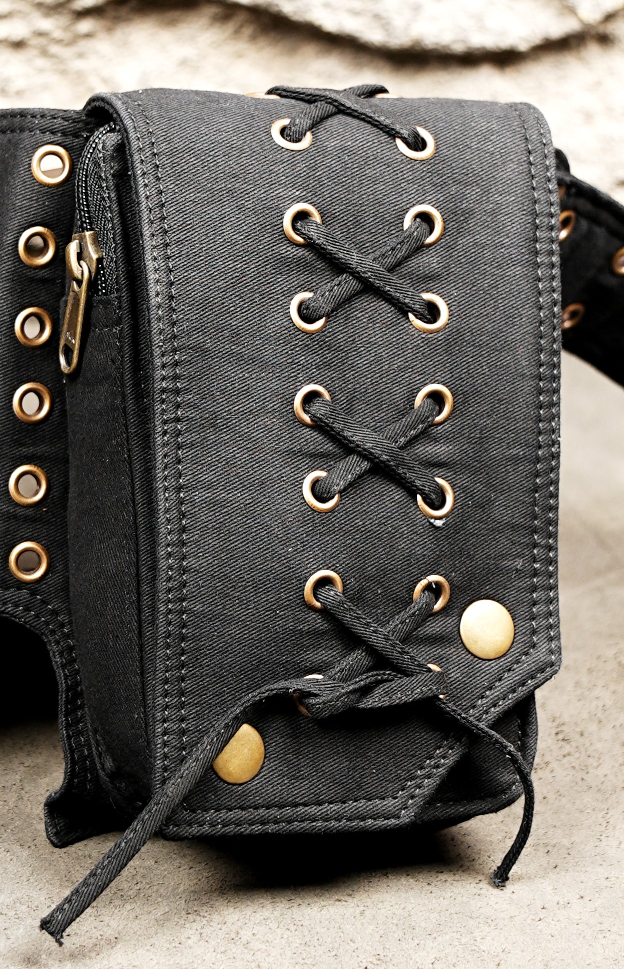Black steampunk utility belt bag with laced pockets for events