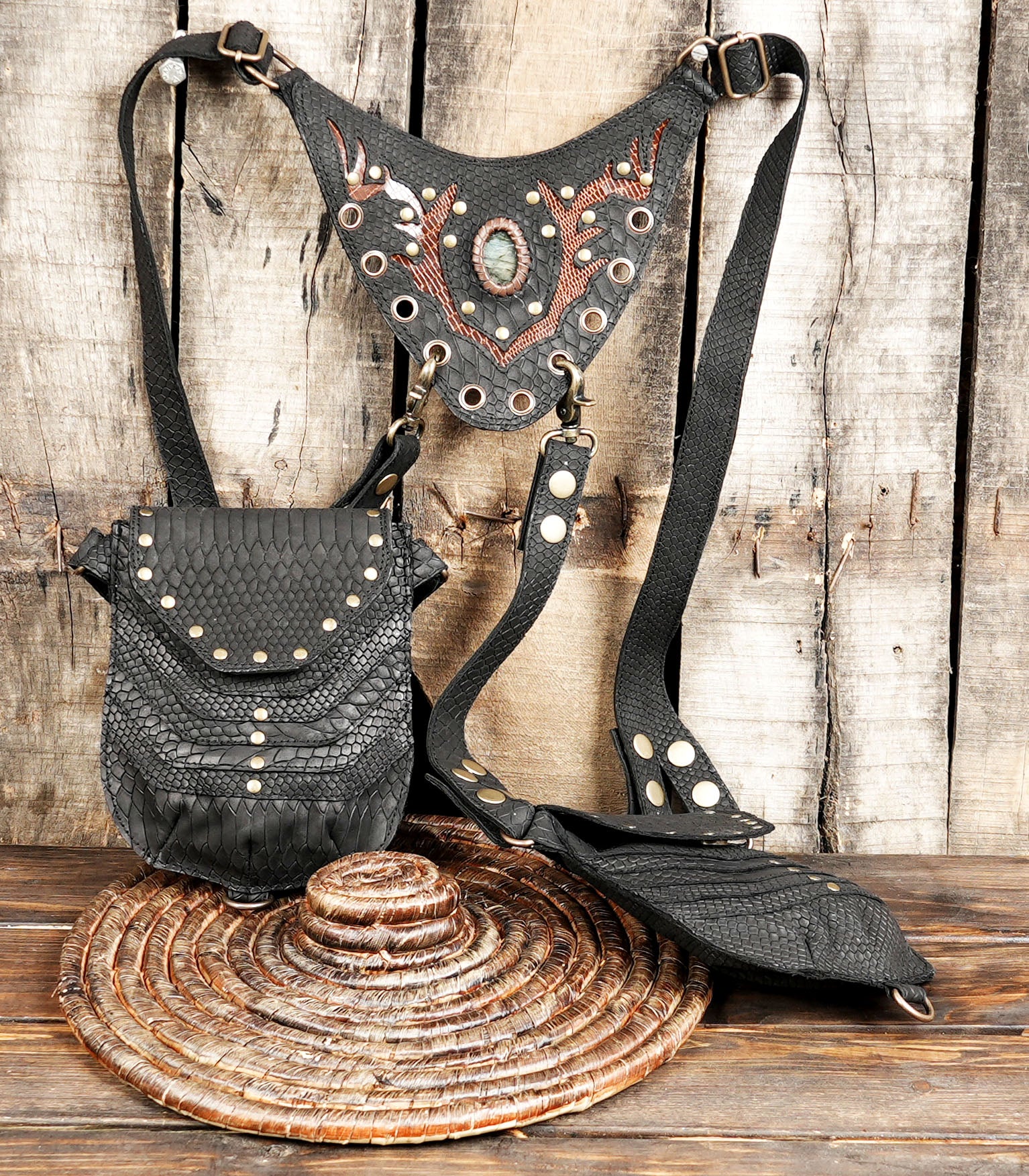 Leather utility rig with studded flap and secure snap fasteners