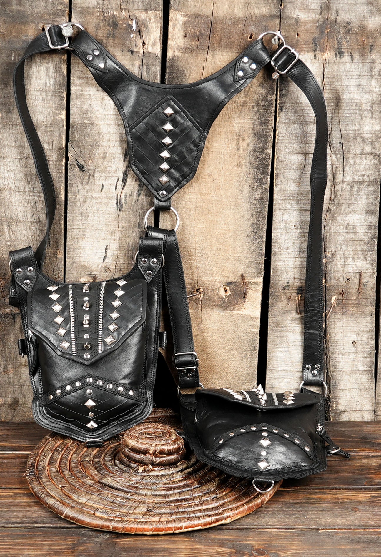 Spiked leather holster bag with dual storage compartments