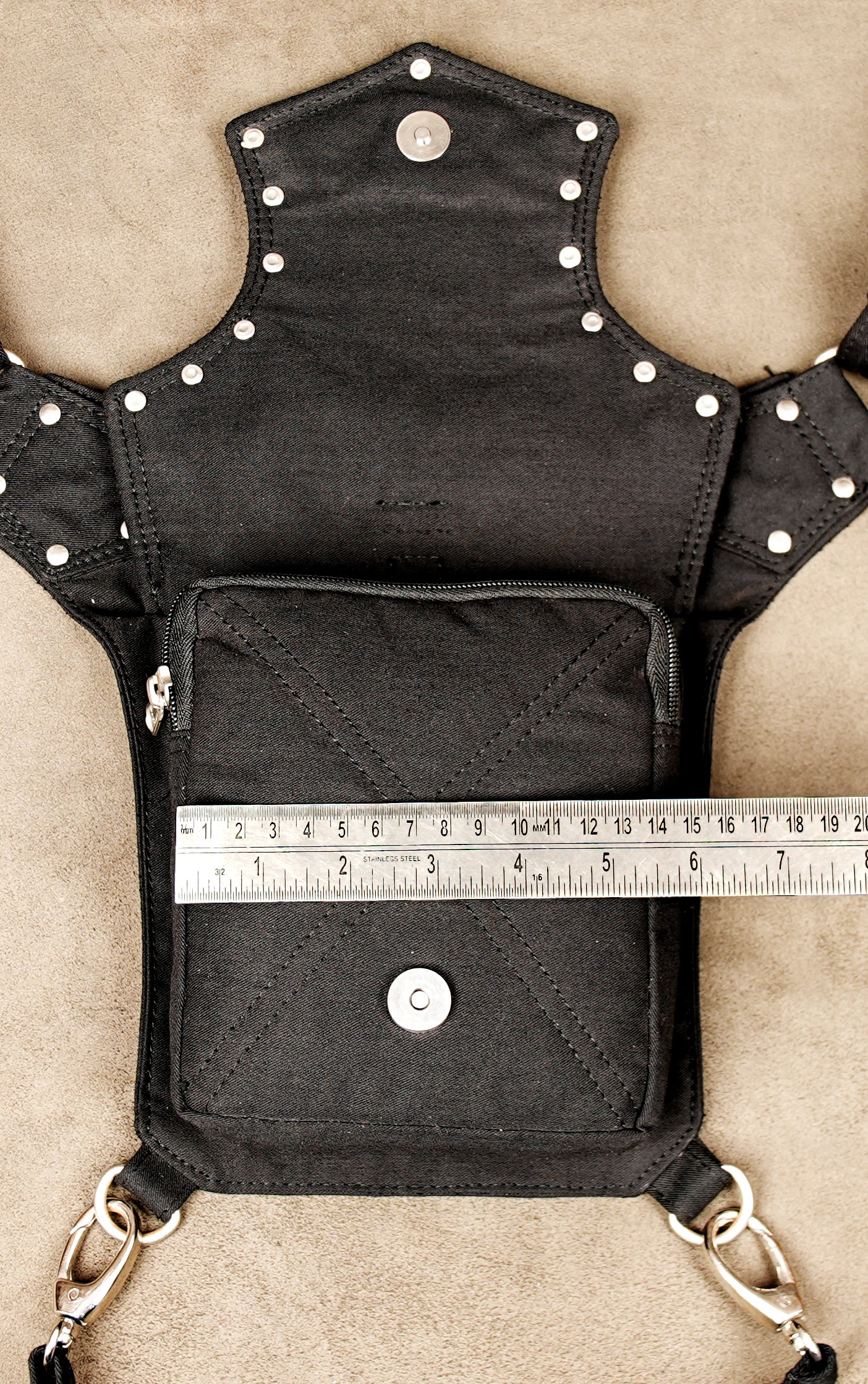 This hands-free utility bag is a stylish alternative to a traditional purse or backpack.