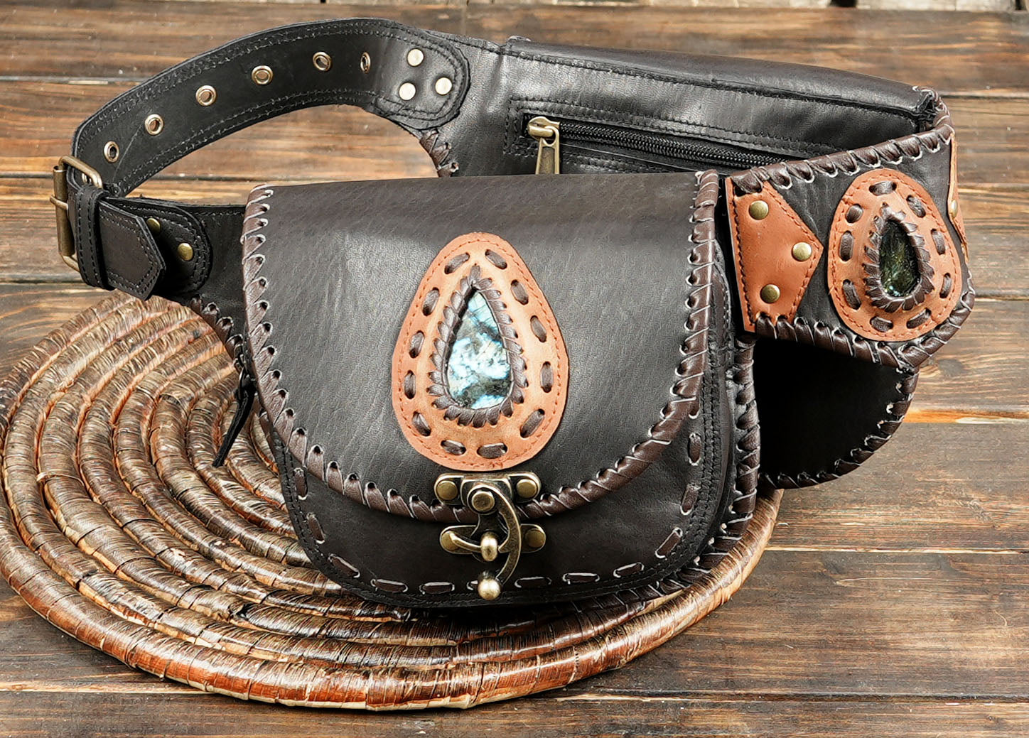 Handcrafted leather utility pouch belt with braided stitching and stone inlay