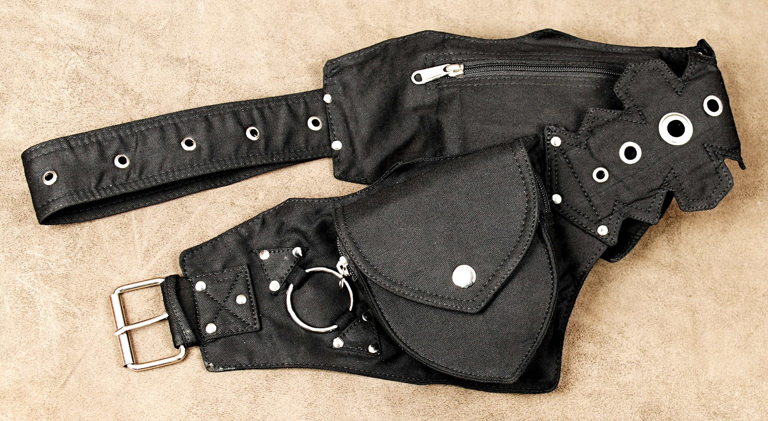 Festival gear black hip bag with pouches, ideal for rave and alternative fashion.