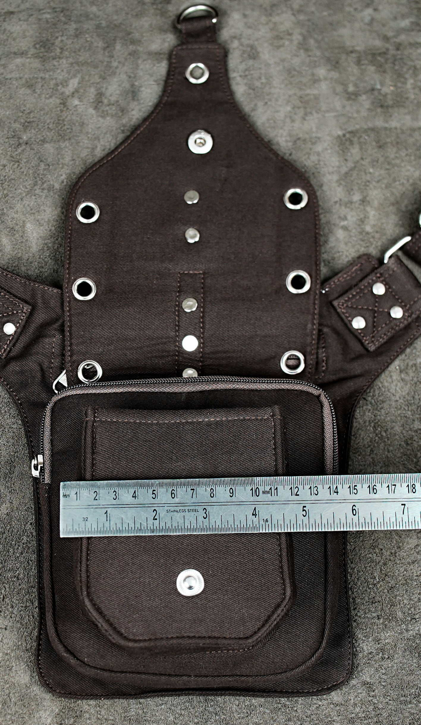 Cotton waist bag laid flat showing front flap and belt