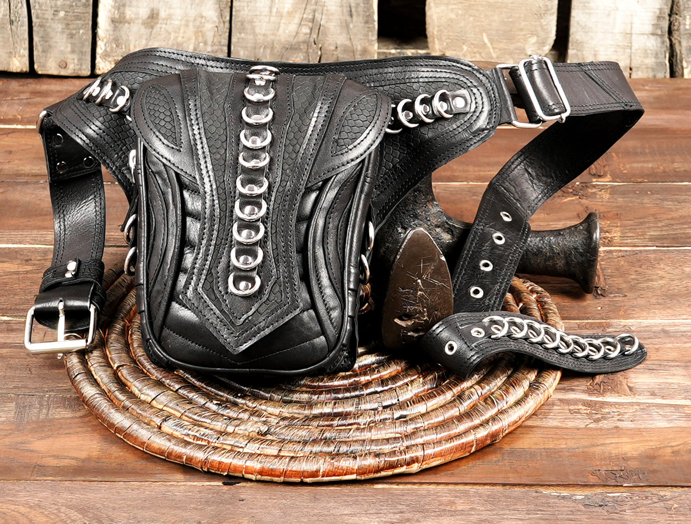 Handmade leather belt pouch with metal ring accents