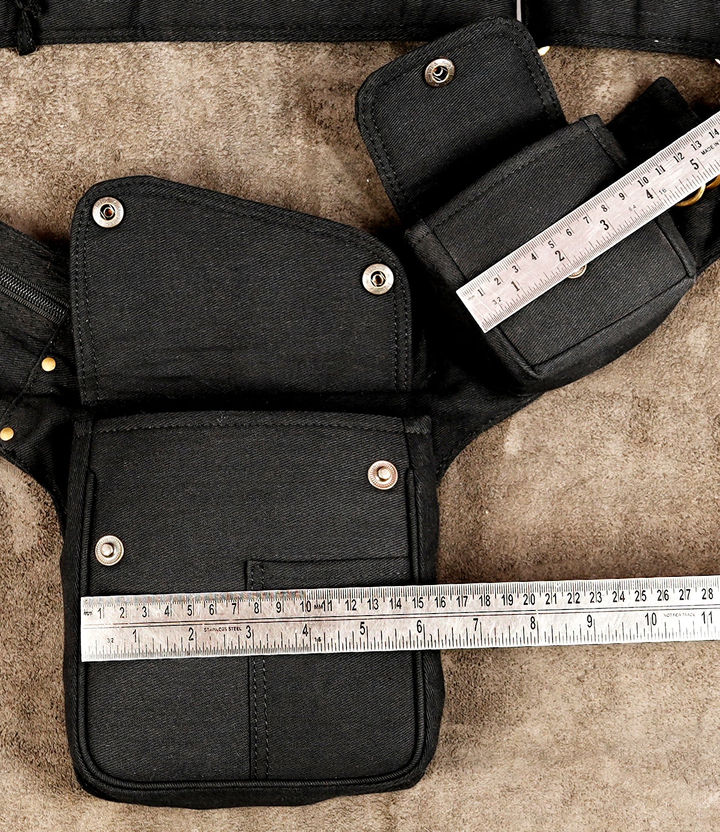Festival-ready black cotton waist bag with specialized compartments