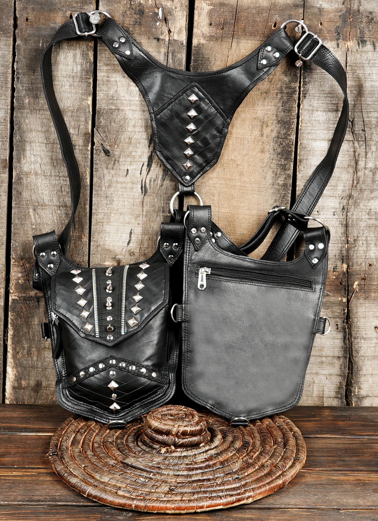 Black leather shoulder harness with decorative metal studs