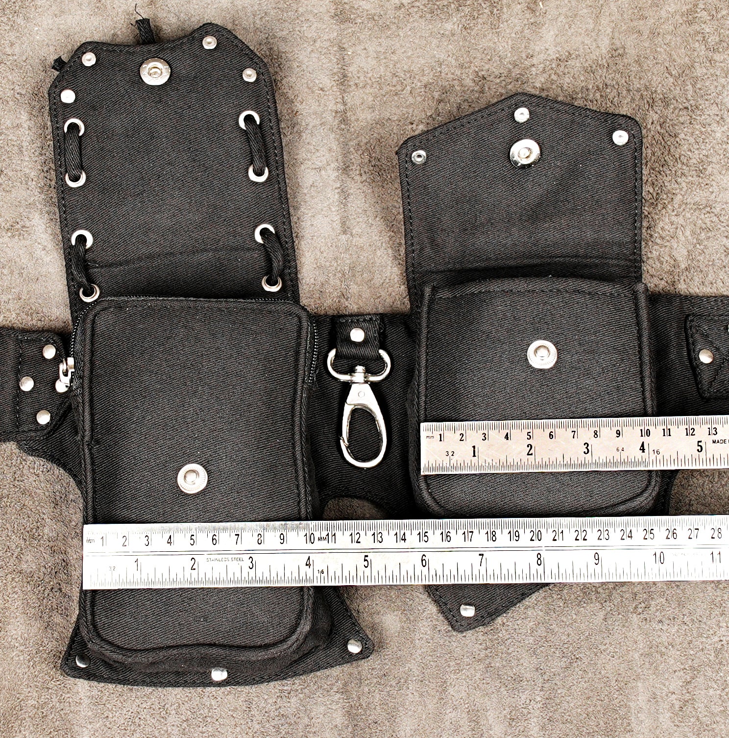 Combined EU/AU: Hands-free festival must-have: an adjustable black canvas bum bag and utility pouch with metal hardware.