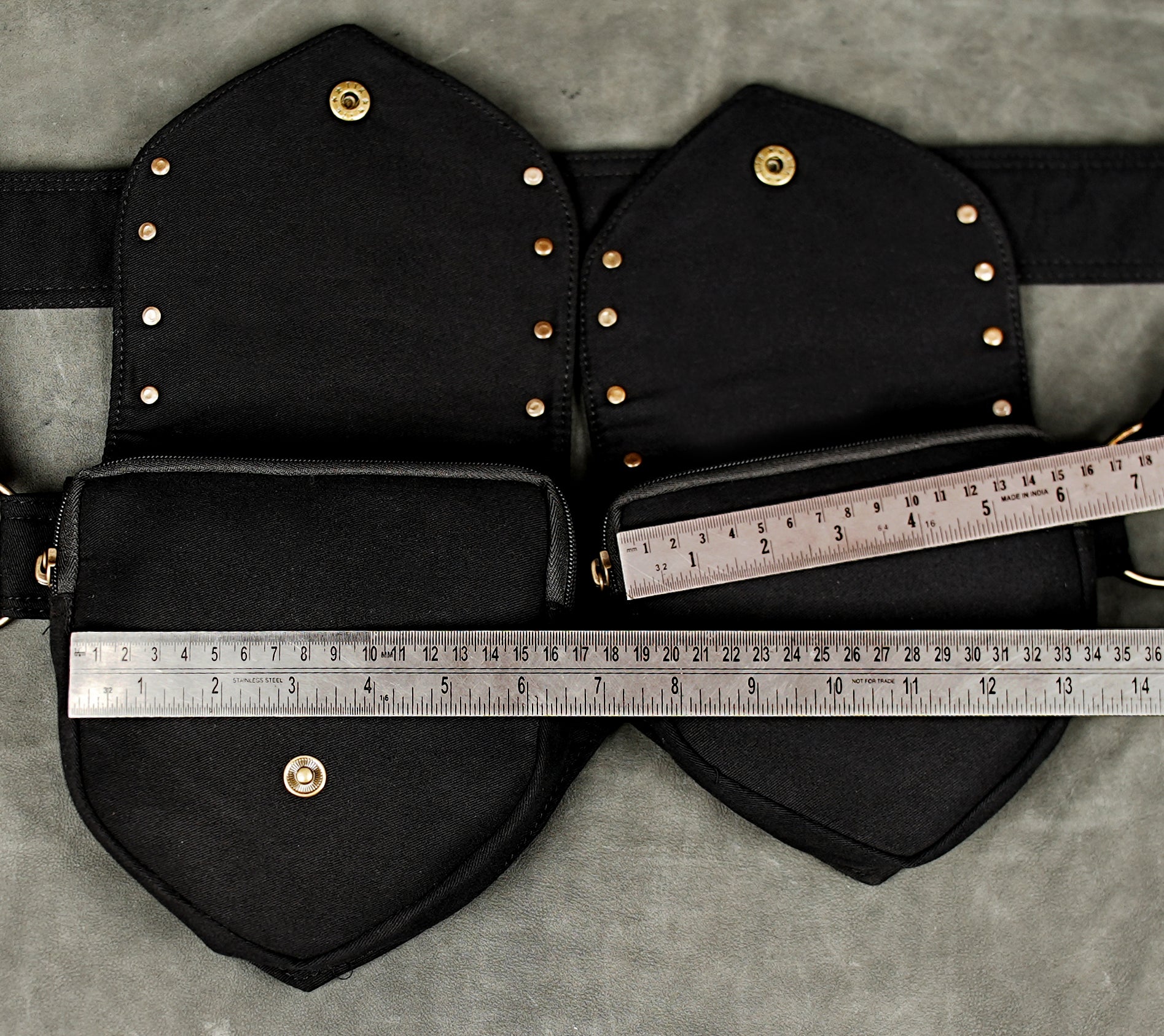 Adjustable cotton utility belt with leaf-shaped flaps and brass stud detailing