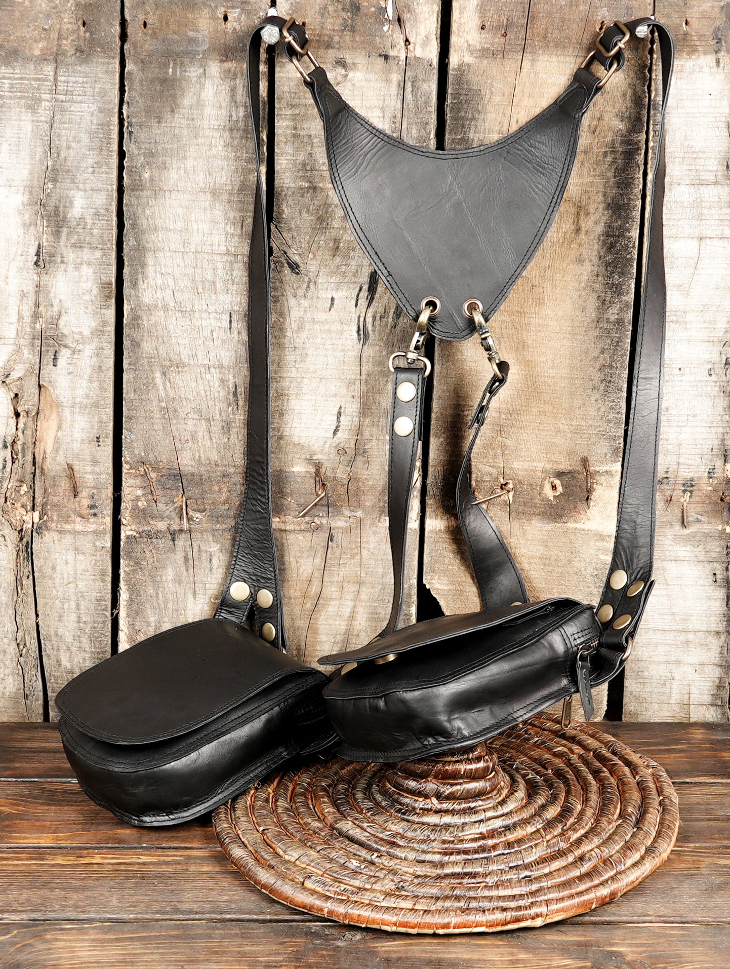 Minimal black leather harness bag for travel and festivals