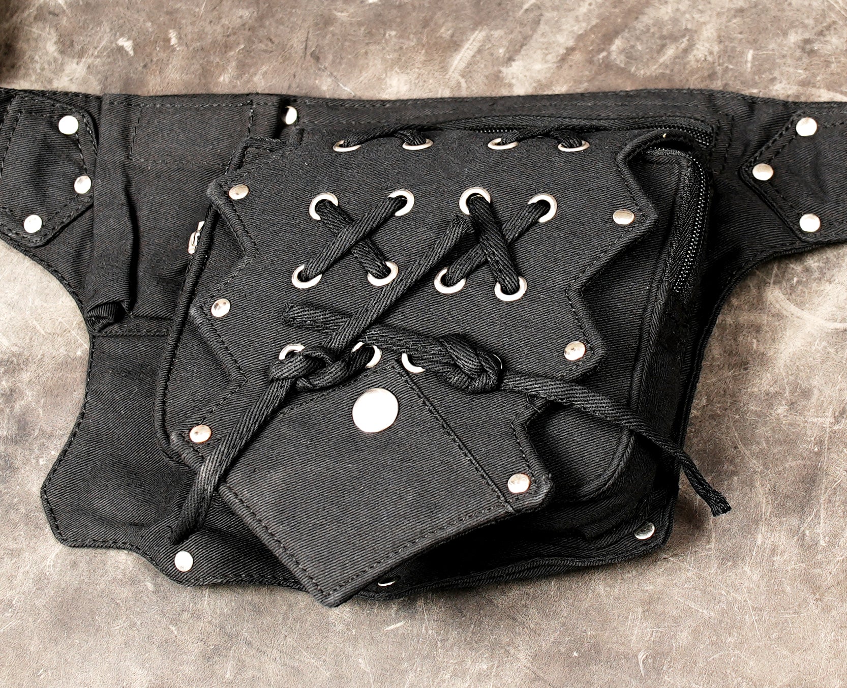 Unique black bumbag, small and stylish, for hands-free convenience.